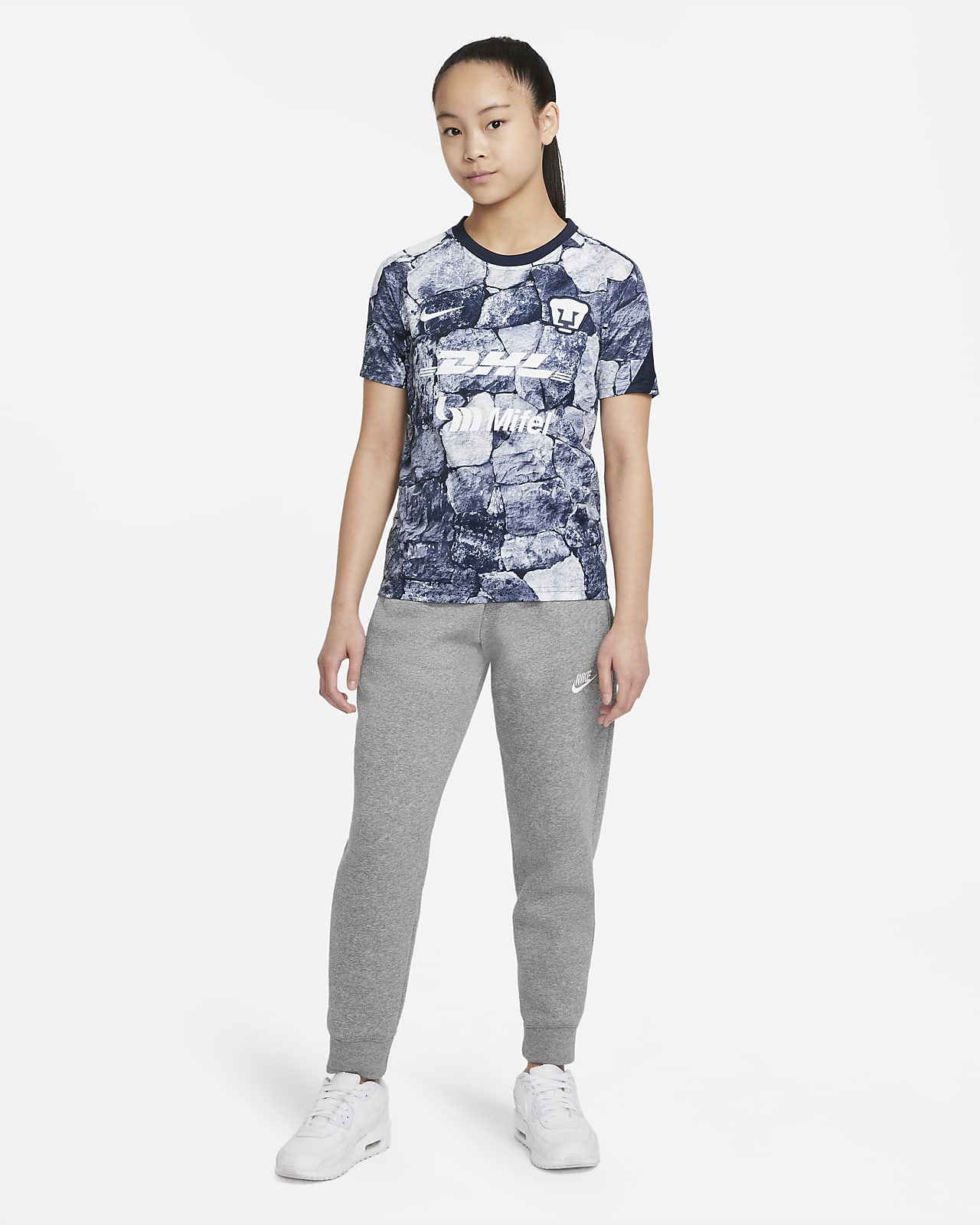 Playera de fútbol para antes del partido Nike Dri-FIT para niños talla  grande Pumas UNAM. Nike MX