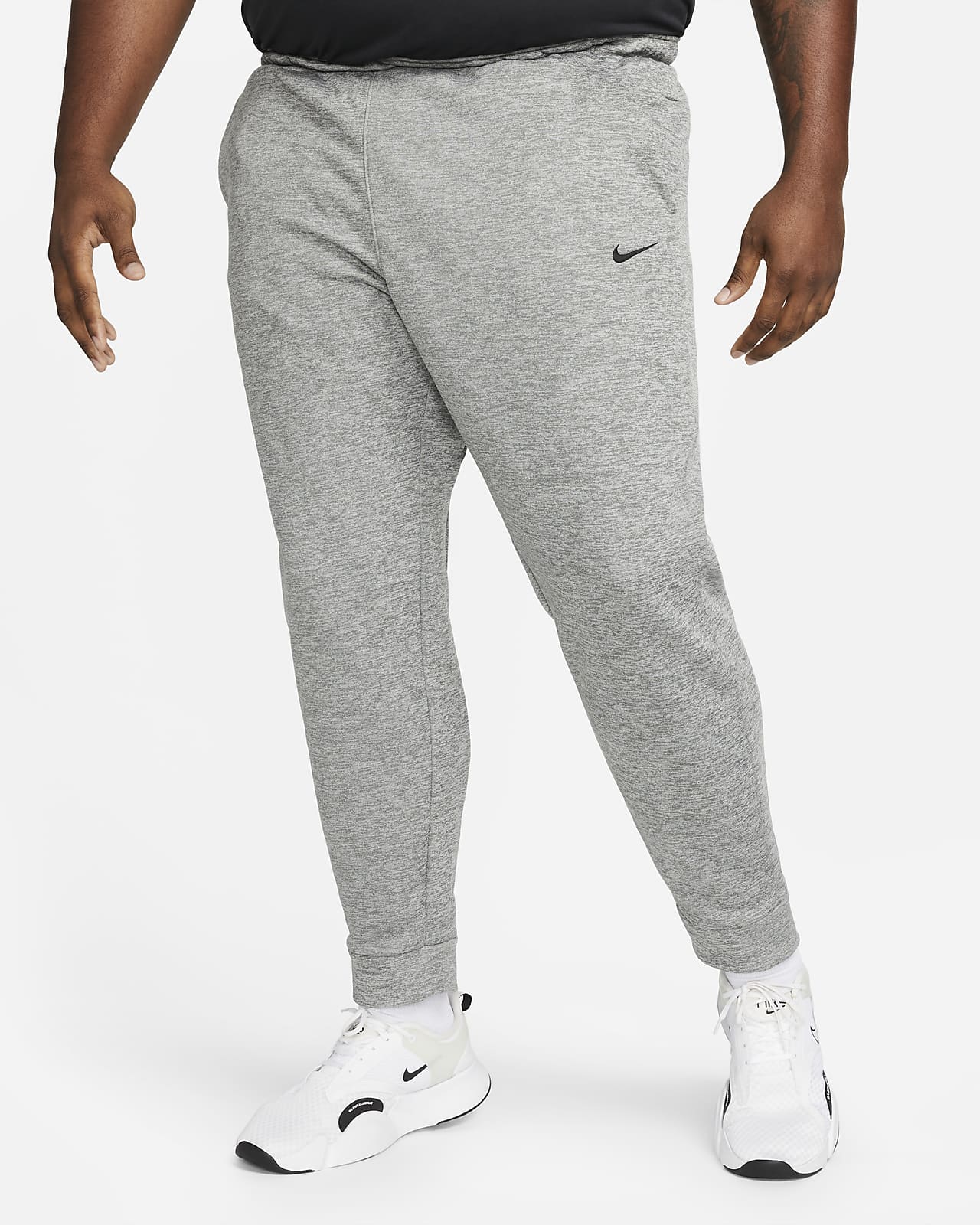 Nike Therma-FIT Men's Tapered Training Trousers. Nike BE