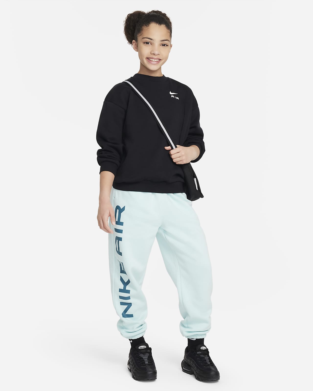 Light blue sports trousers for boys and girls with inserts of different  colors  NIKE  Pavidas