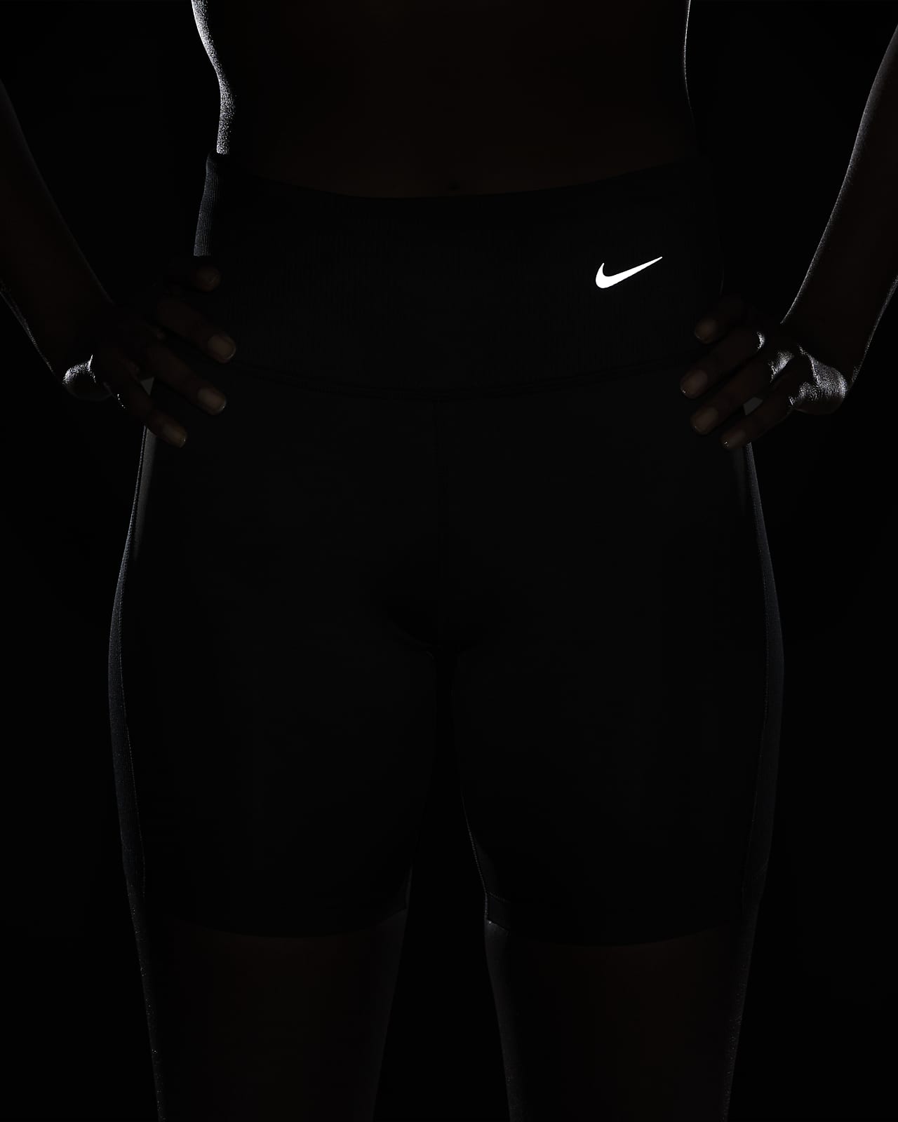 Nike Women's Tight Mid-Rise Ribbed-Panel Running Shorts with Pockets.