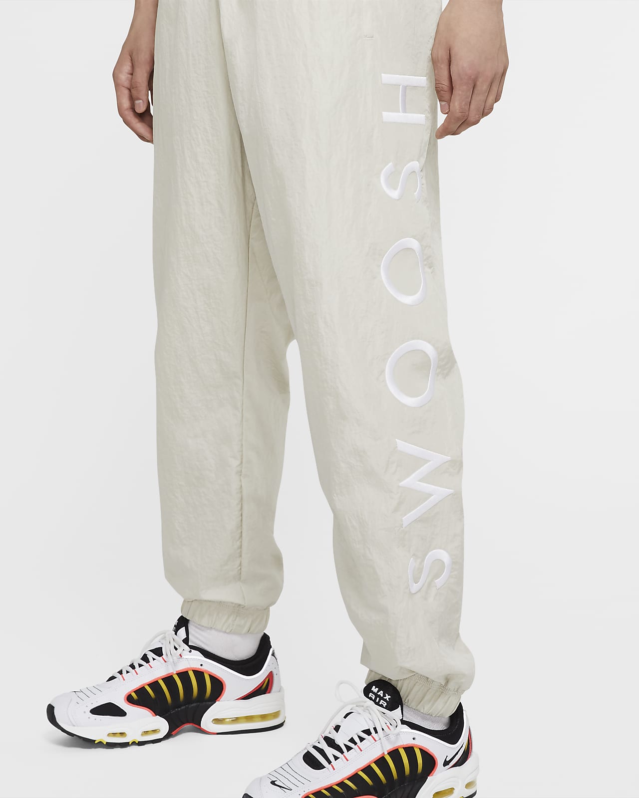 nike swoosh woven trousers