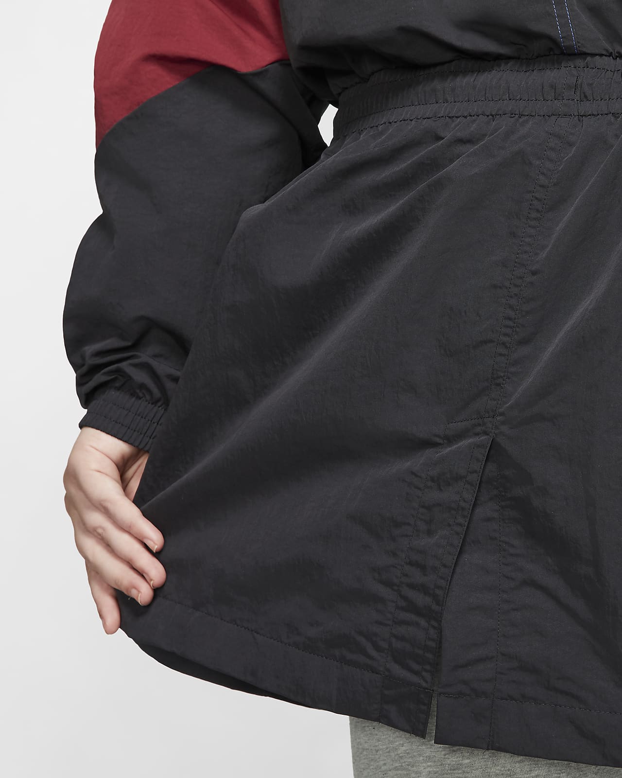 nike woven track top