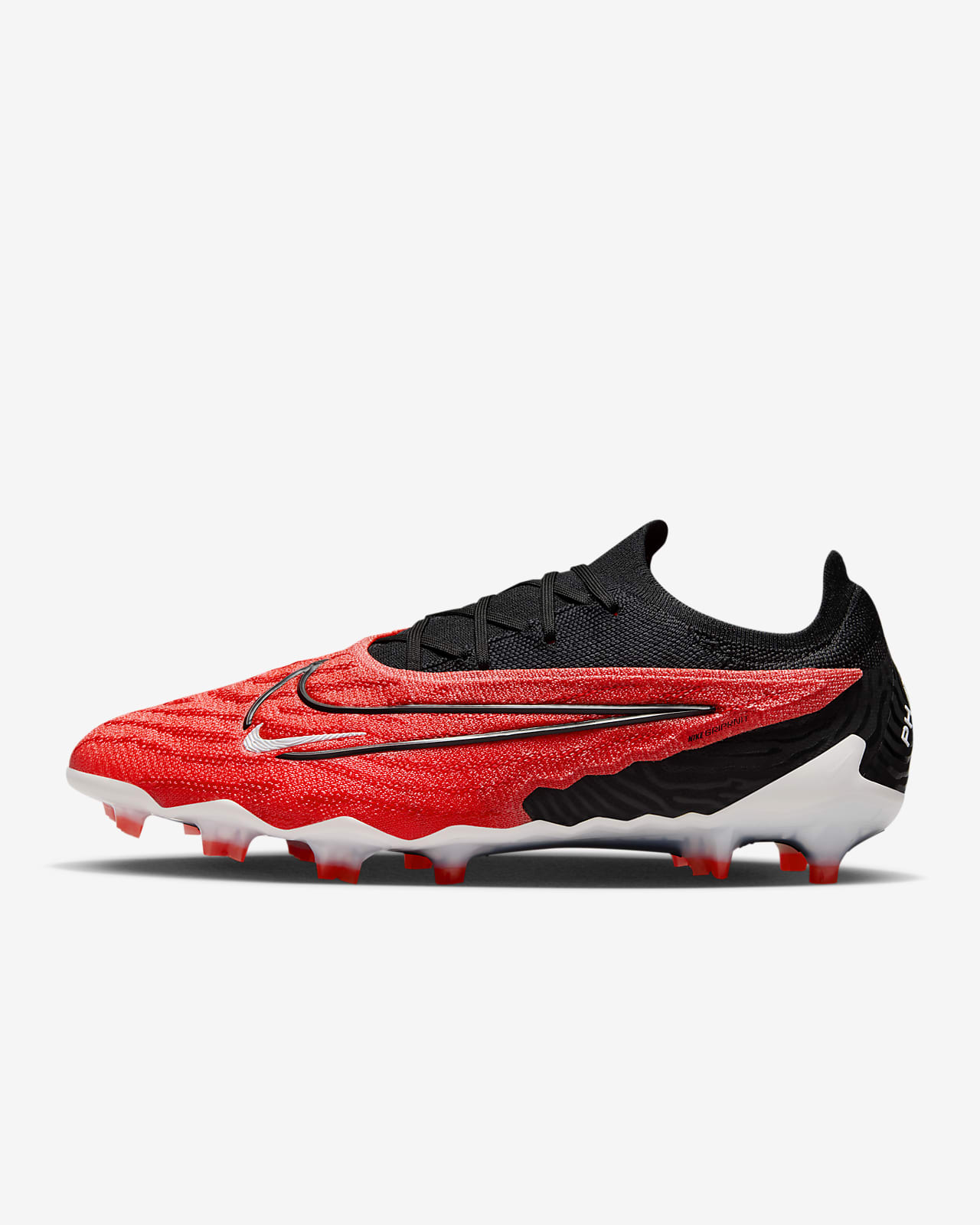 Nike Phantom GX Elite Firm Ground Low Top Soccer Cleat. Nike