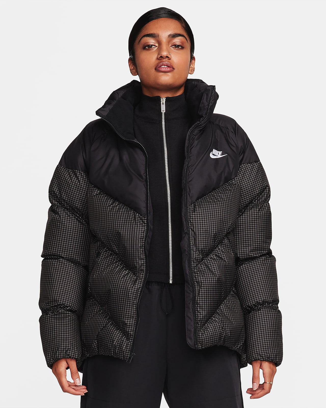 Stay Warm and Stylish with the Women's Nike Puffer Jacket