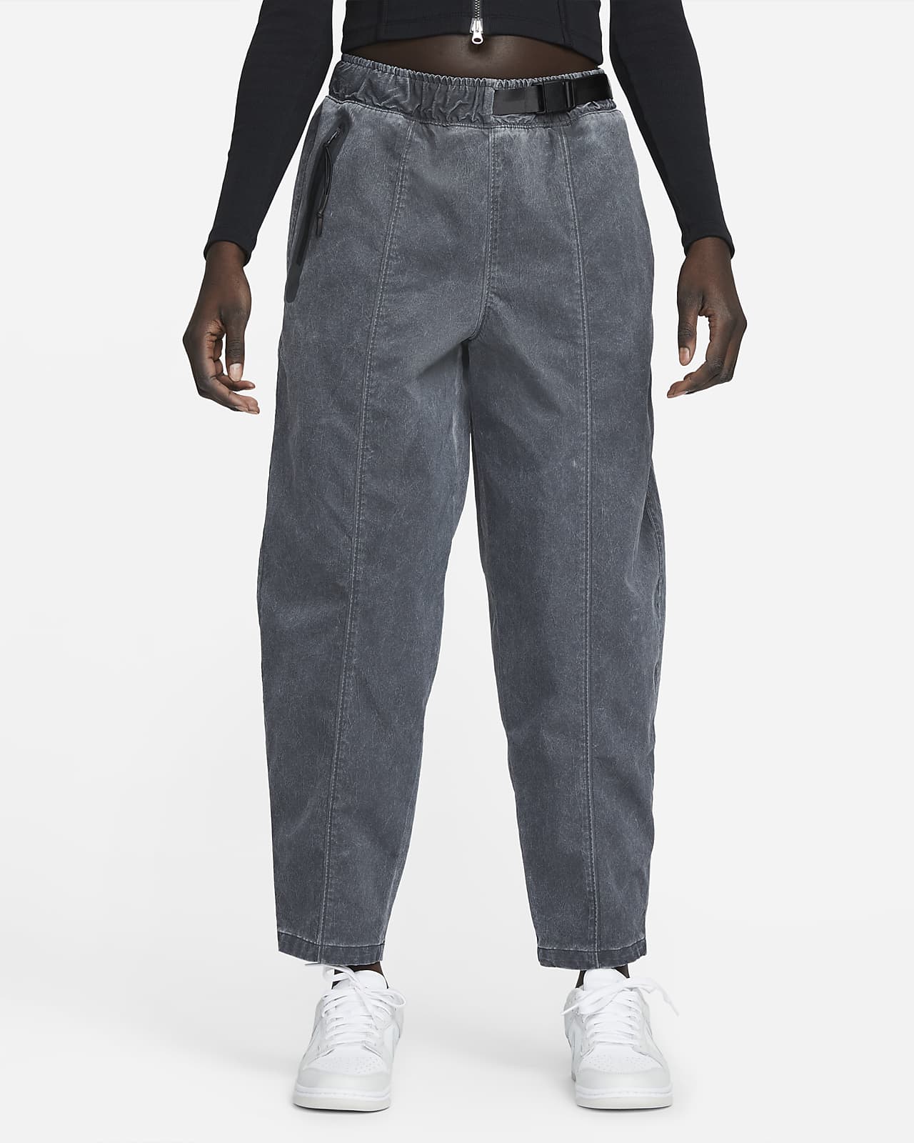 Pantaloni a vita alta in tessuto Nike Sportswear Dri-FIT Tech Pack - Donna.  Nike CH
