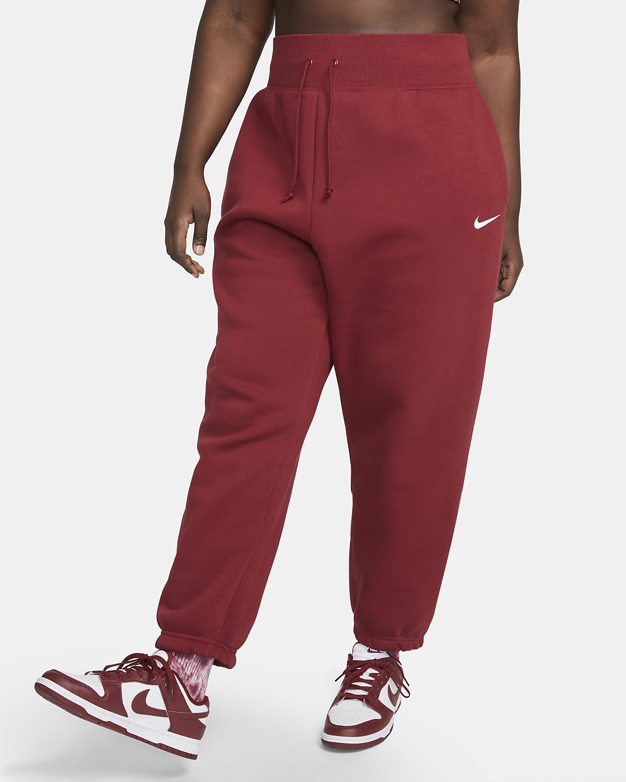 Calças de fato de folgadas de cintura Nike Sportswear Fleece para mulher (tamanhos grandes). Nike