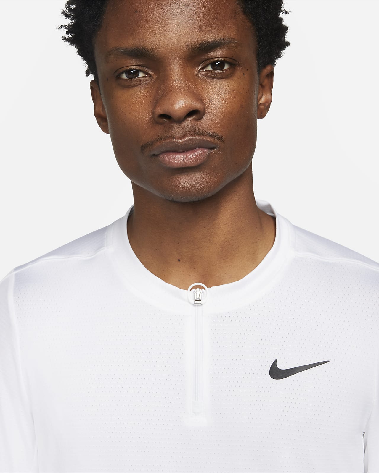 Playera de tenis con medio cierre para hombre NikeCourt Dri-FIT Advantage.  Nike.com