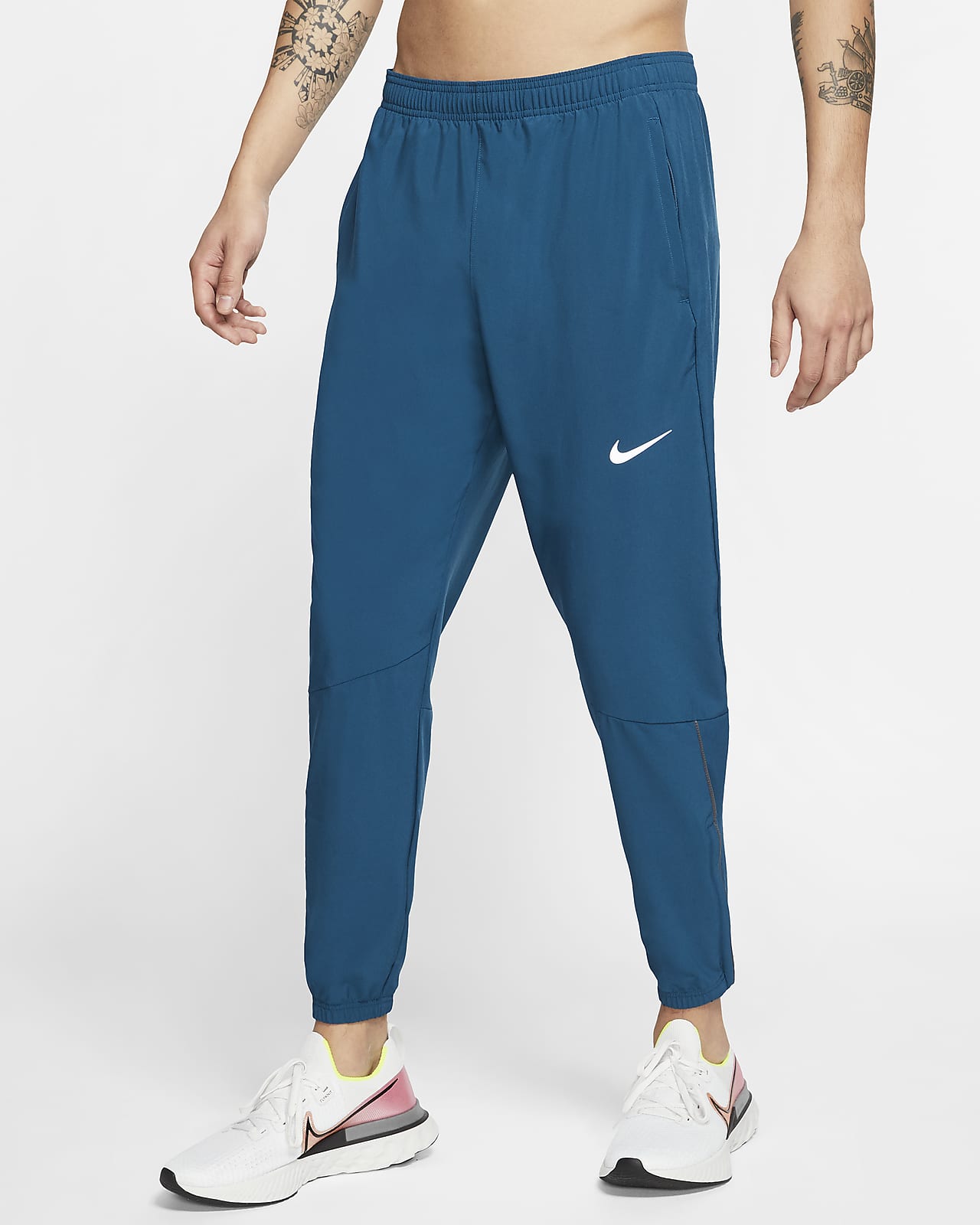 calça nike flex challenger woven masculina