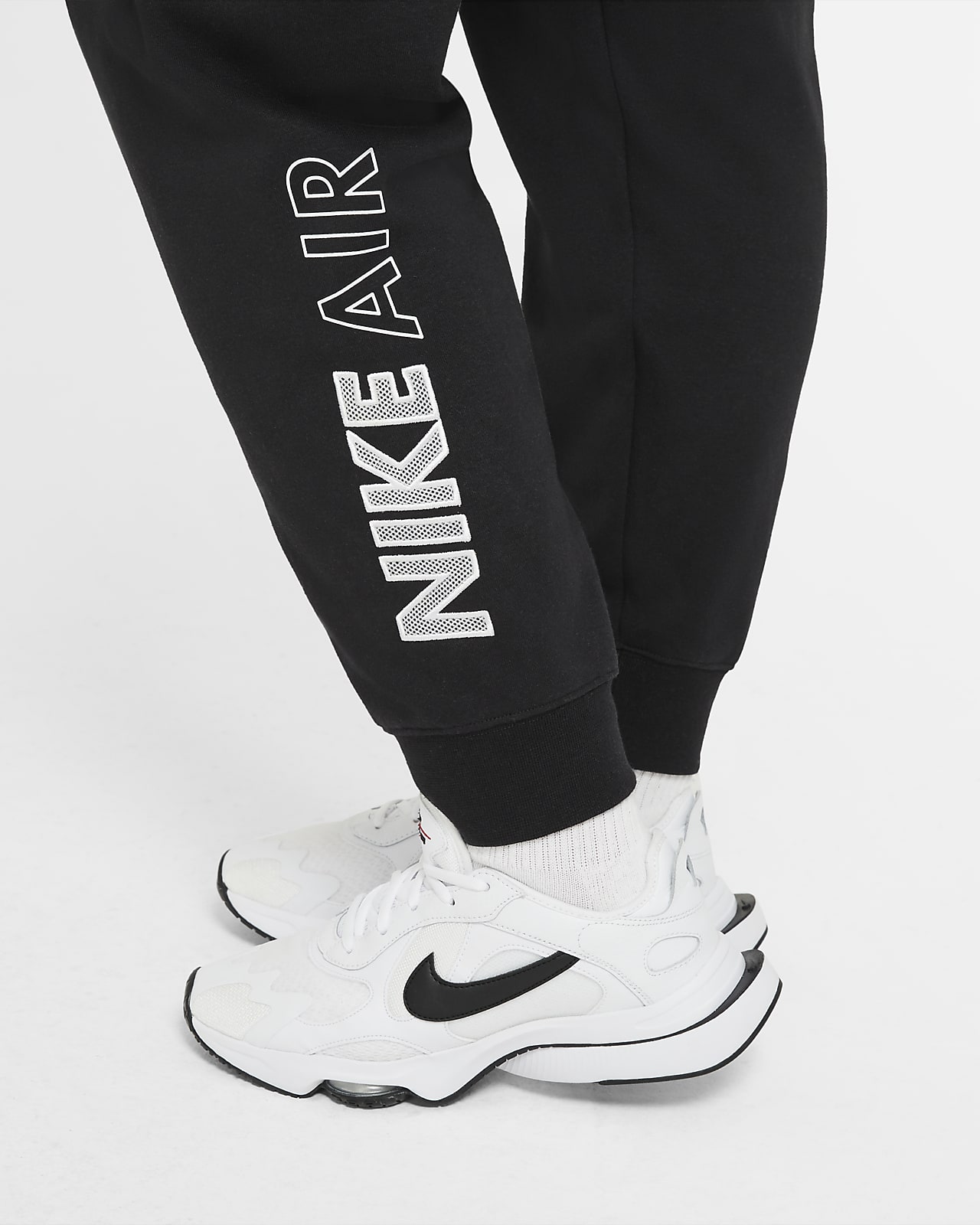 taille nike survetement