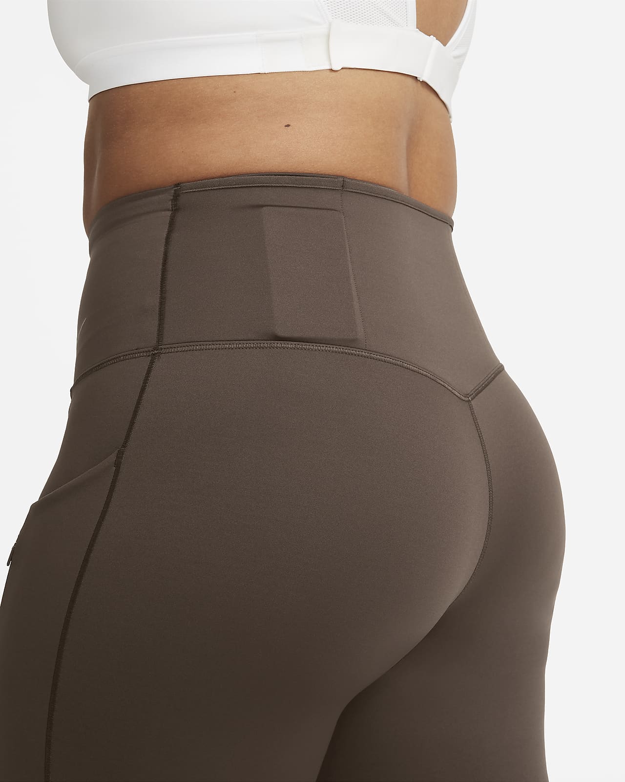 Nike Universa közepes tartást adó, magas derekú, teljes hosszúságú  cipzáros, zsebes női leggings