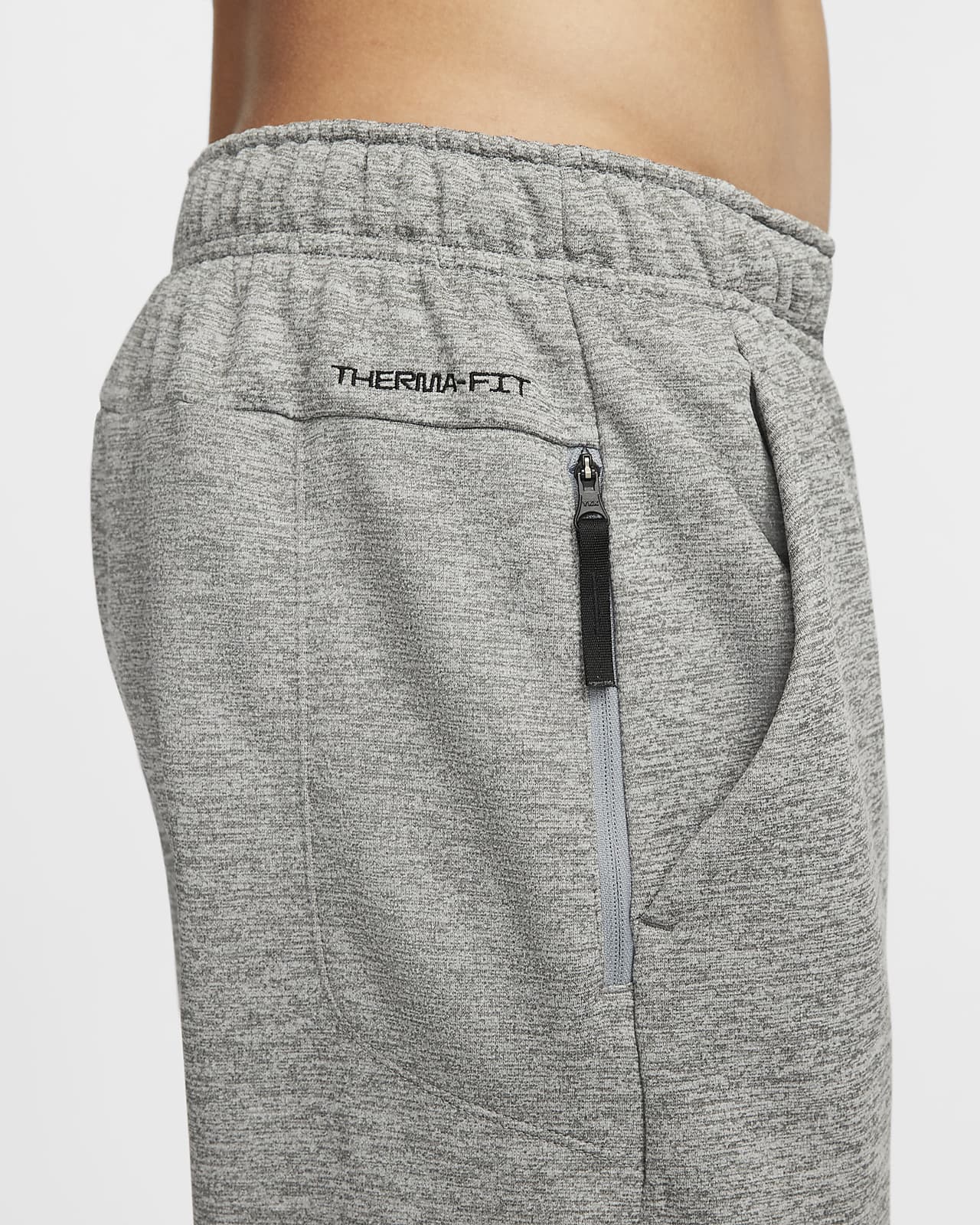 Nike Therma-FIT Fitnessbroek met taps toelopend design en Swoosh graphic  voor heren. Nike NL