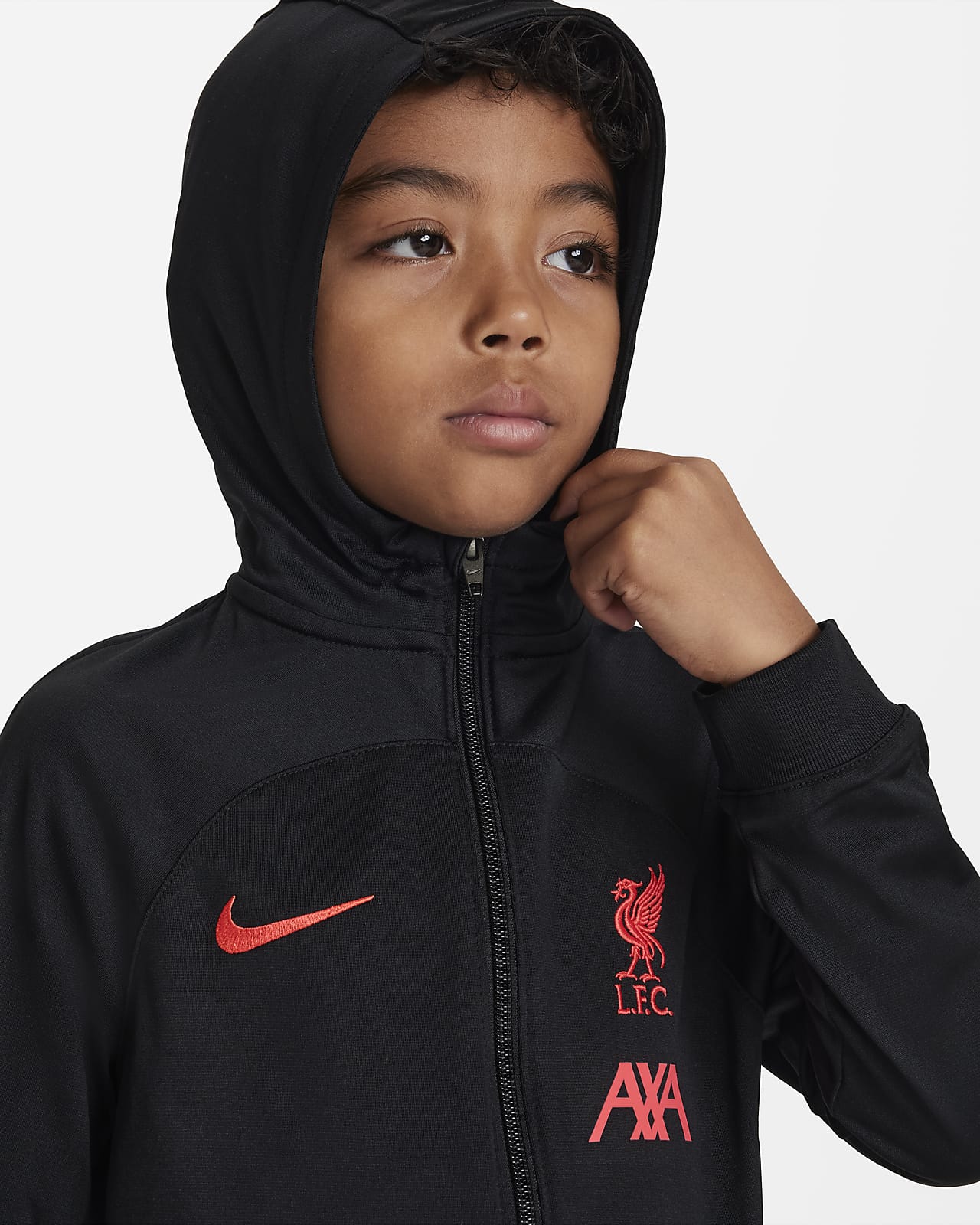 Liverpool F.C. Strike Younger Kids' Nike DriFIT Hooded Football Tracksuit. Nike IE Liverpool F.C. Strike Younger Kids' Nike DriFIT Hooded Football Tracksuit. Nike IE