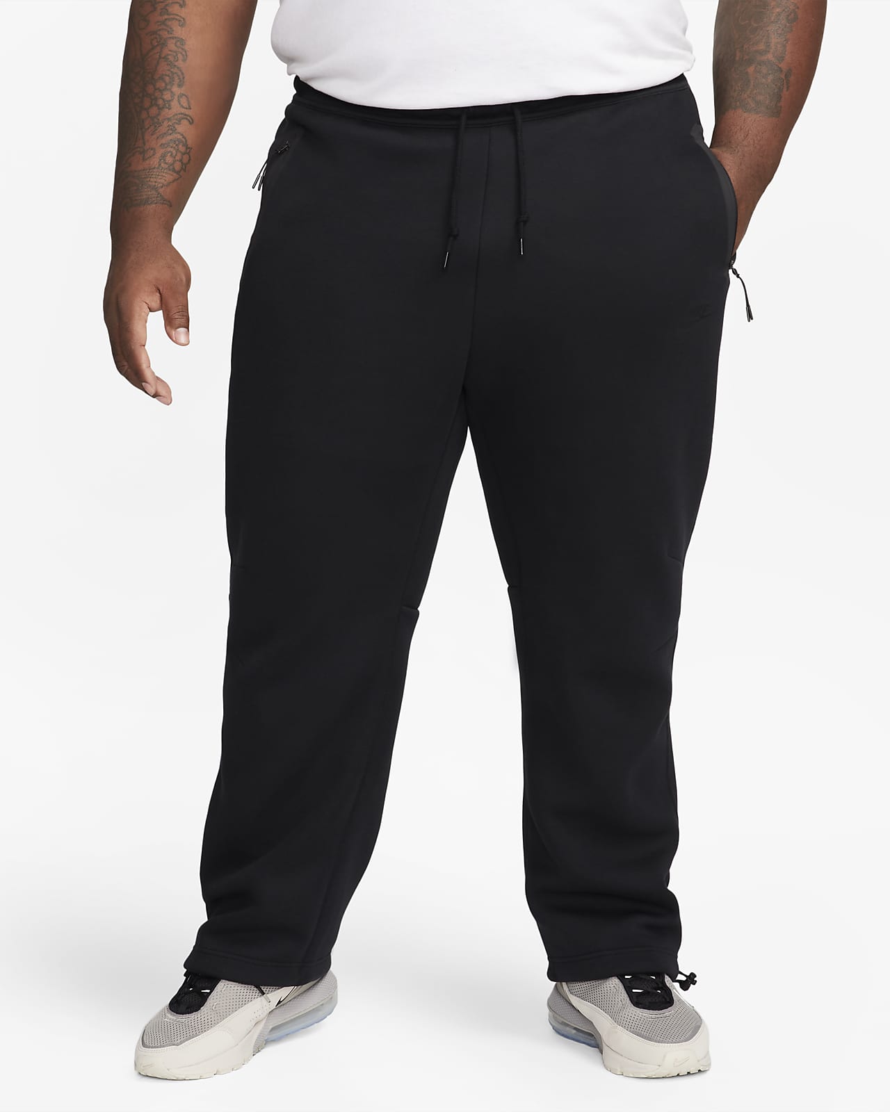 Nike Club Essentials open hem sweatpants in black - ShopStyle Activewear  Pants