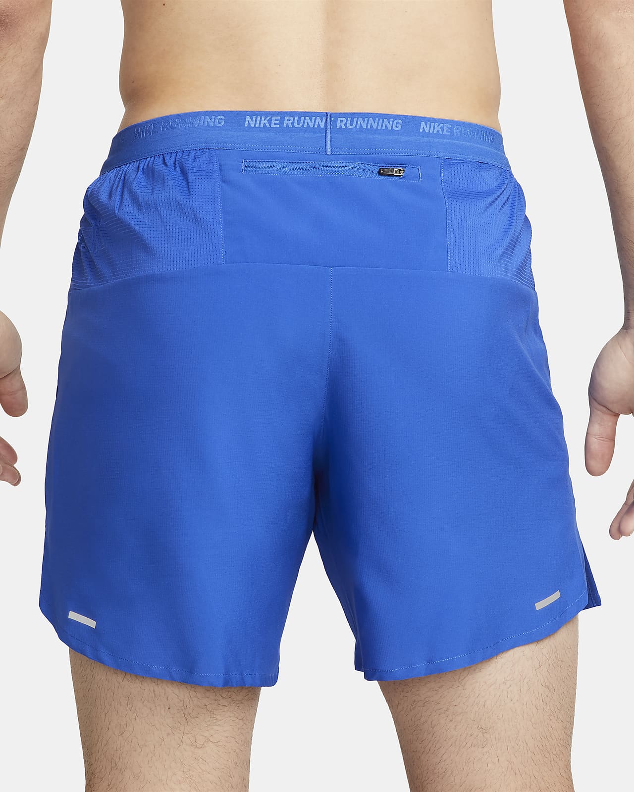 Nike Performance STRIDE - Sports shorts - adobe/red stardust/coral 