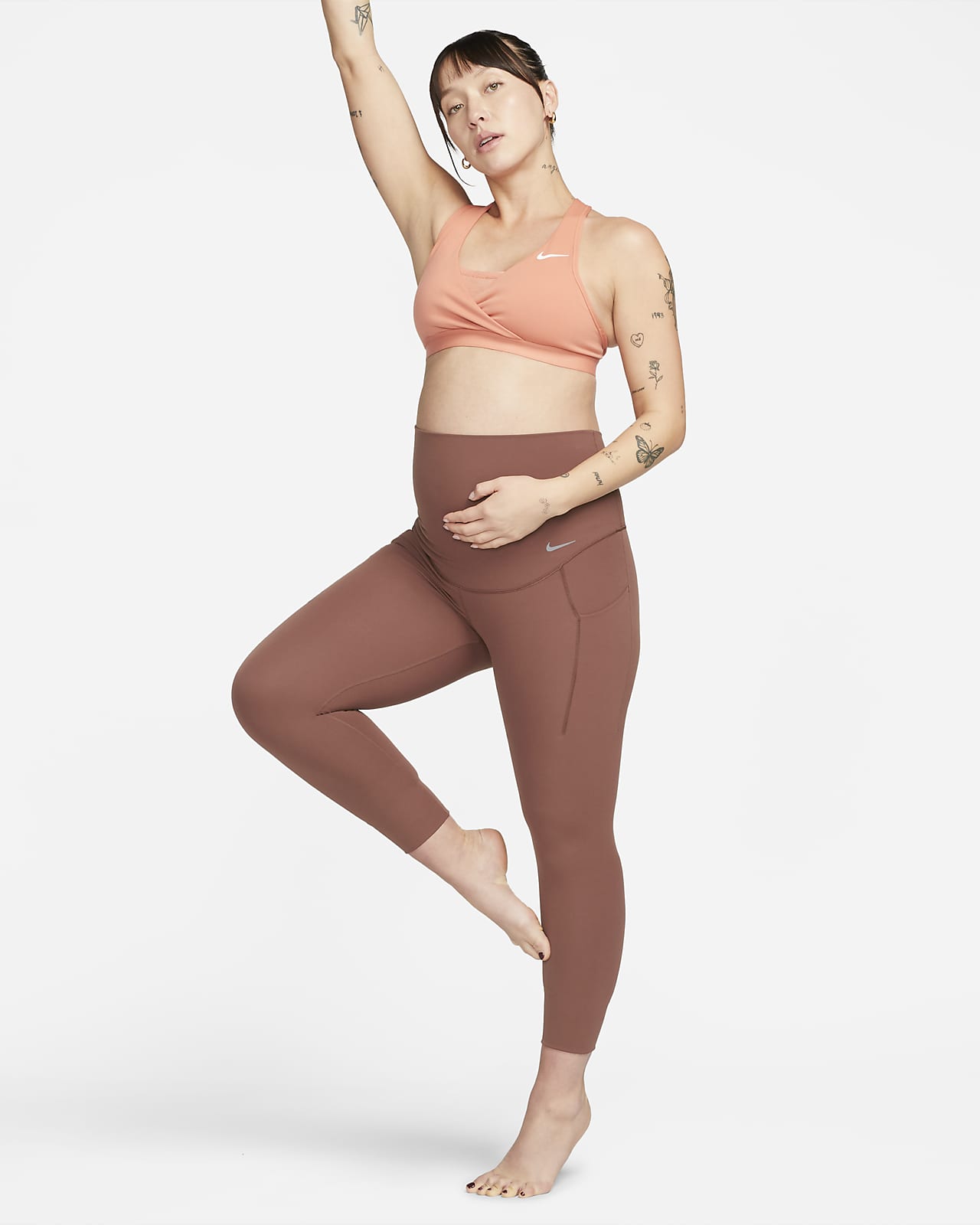 Nike Zenvy (M) 7/8-legging met iets ondersteunende hoge taille zakken voor dames (zwangerschapskleding). Nike BE