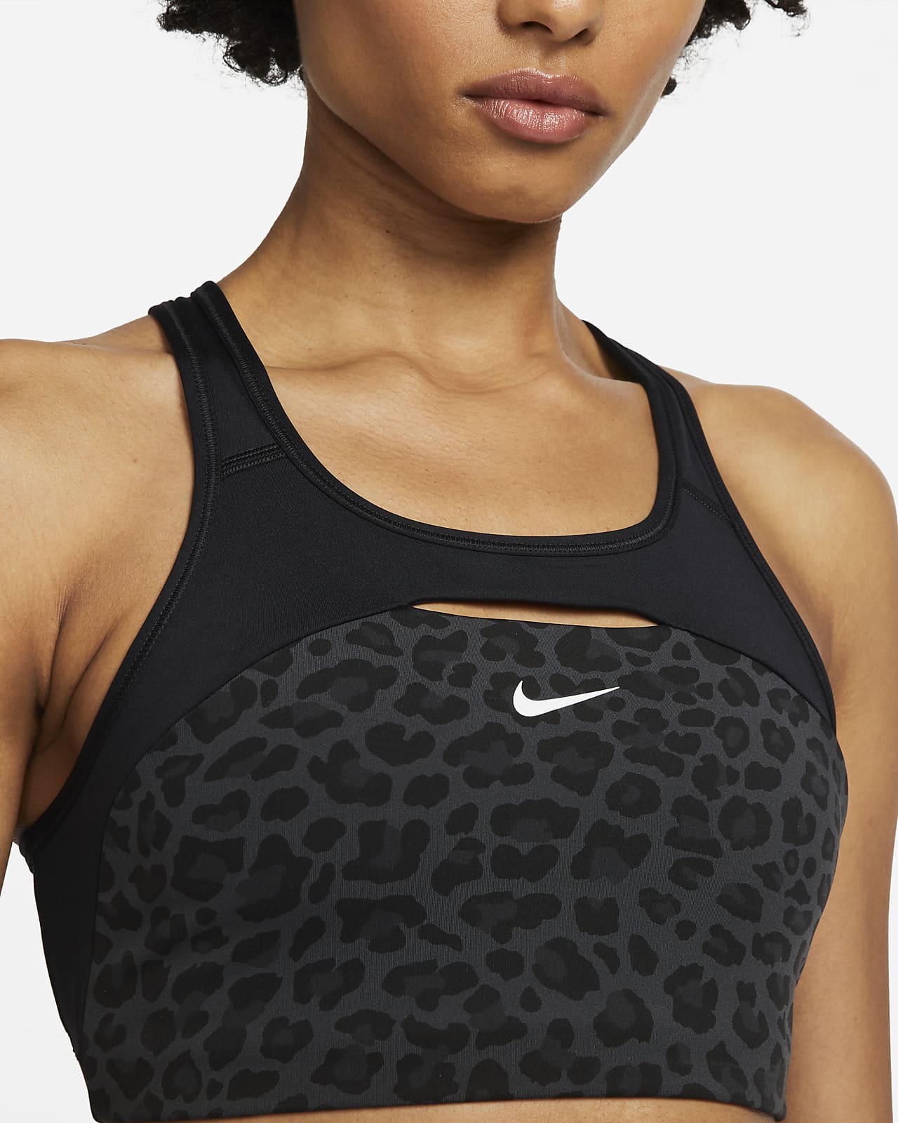 Bra non imbottito a sostegno medio con stampa leopardata Nike Dri-FIT  Swoosh – Donna. Nike IT