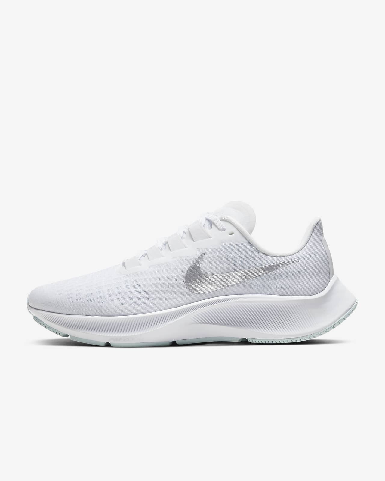 white and grey nike running shoes