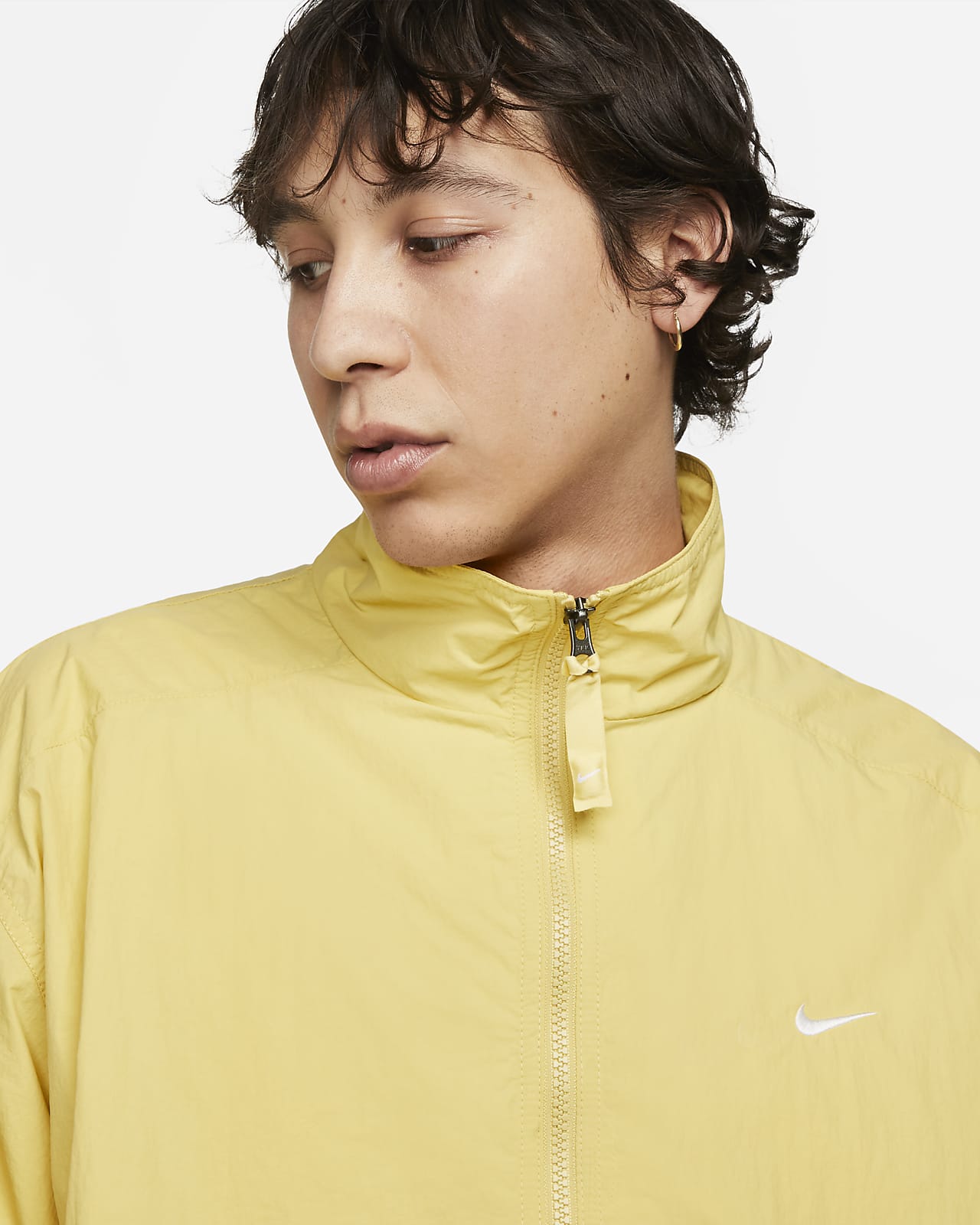 nike swoosh tracksuit gold