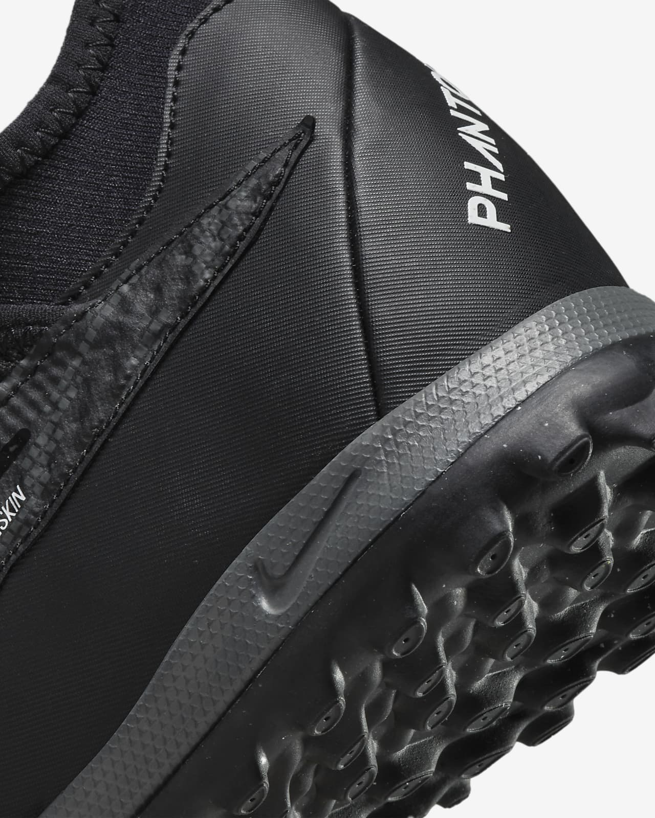 Nike Phantom GX Academy Dynamic Fit TF Turf Soccer Shoes. 
