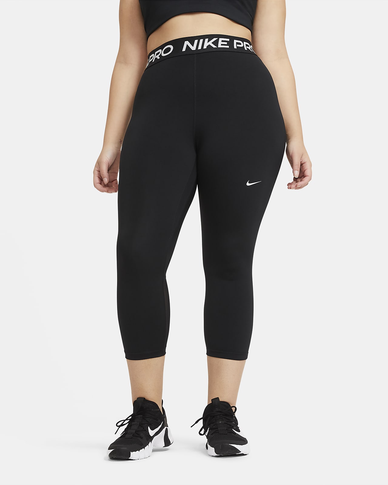 Damskie legginsy o skróconym kroju ze średnim stanem Nike Pro (duże rozmiary)