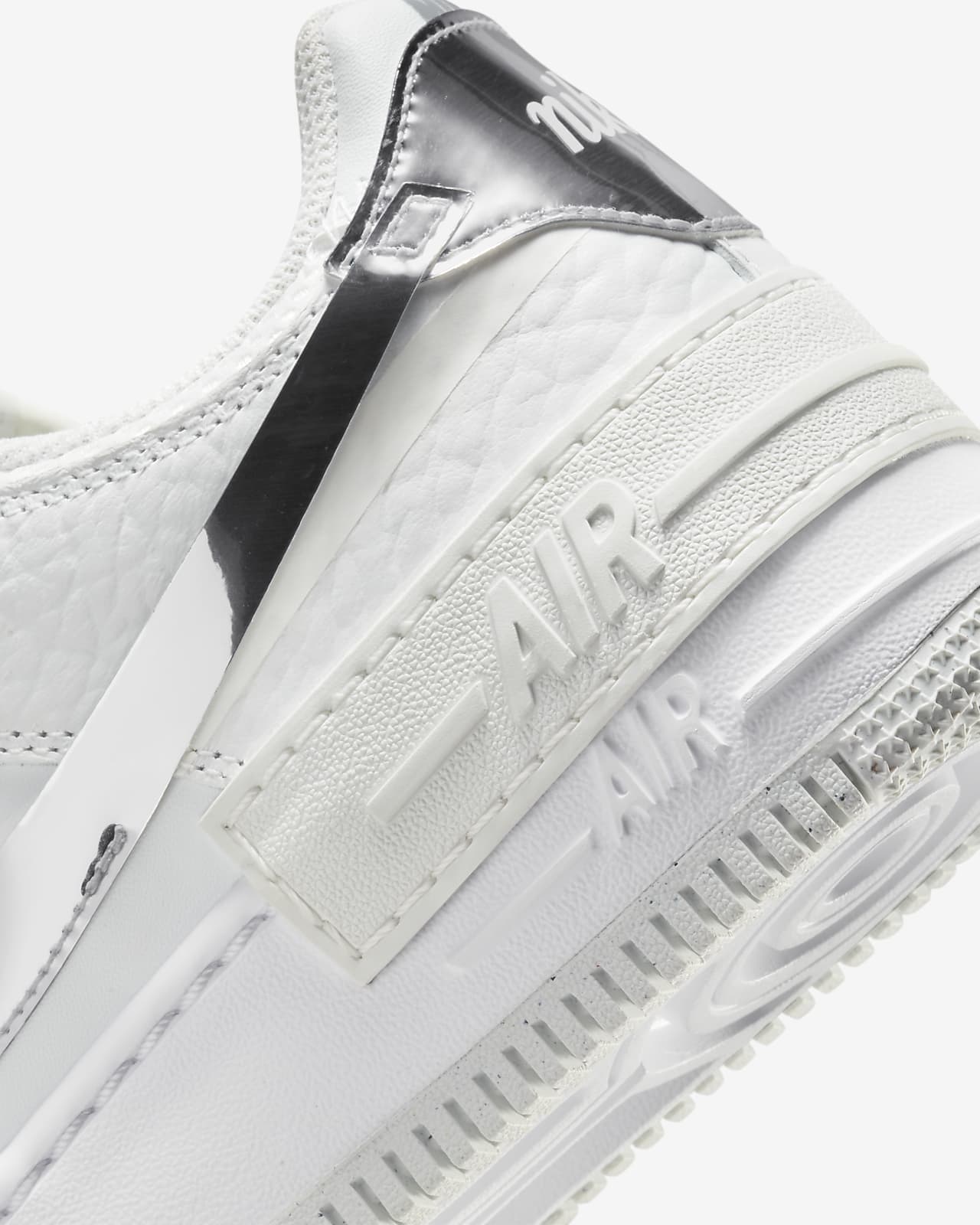 nike air force basse bianche e argento