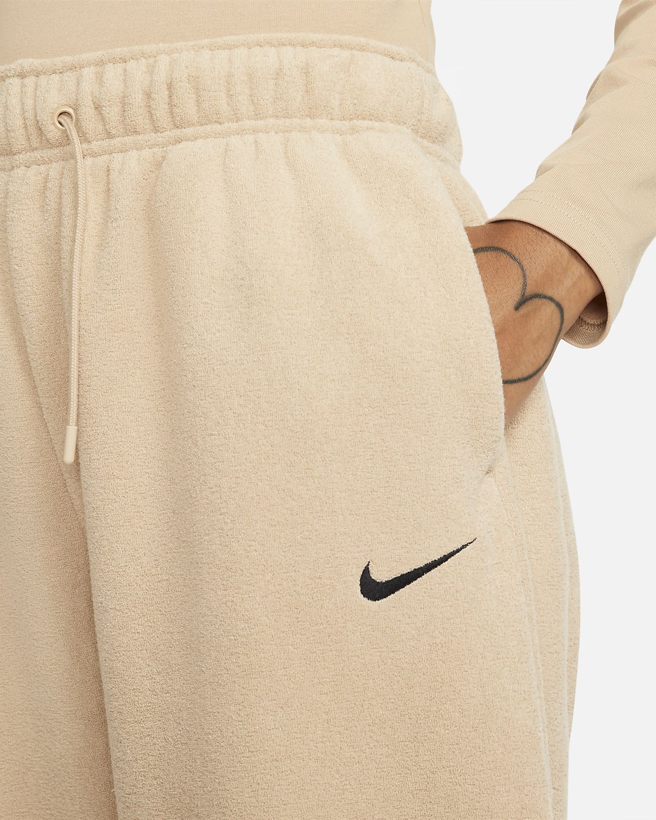Pantaloni jogger morbidi a vita alta Nike Sportswear Essentials - Donna.  Nike IT