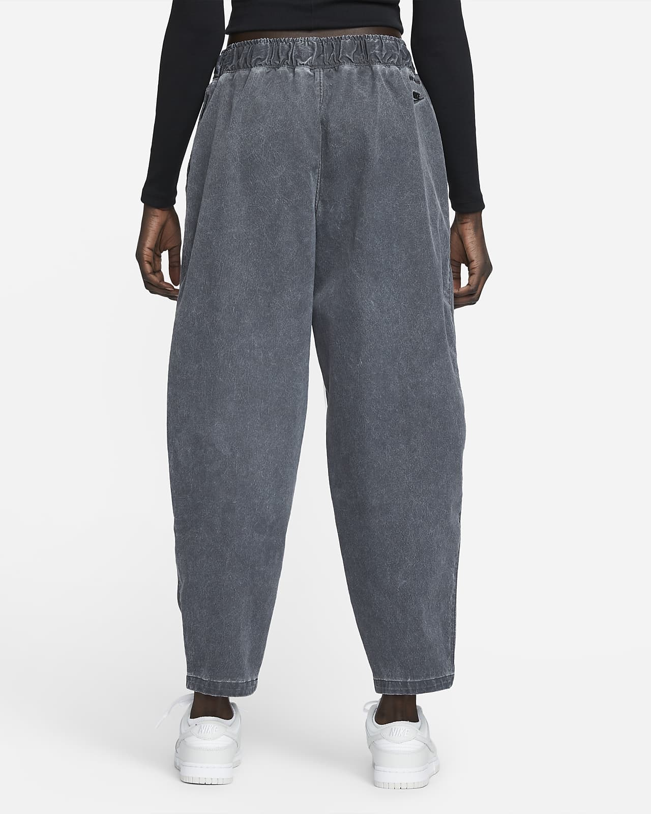 Pantaloni a vita alta in tessuto Nike Sportswear Dri-FIT Tech Pack - Donna.  Nike CH