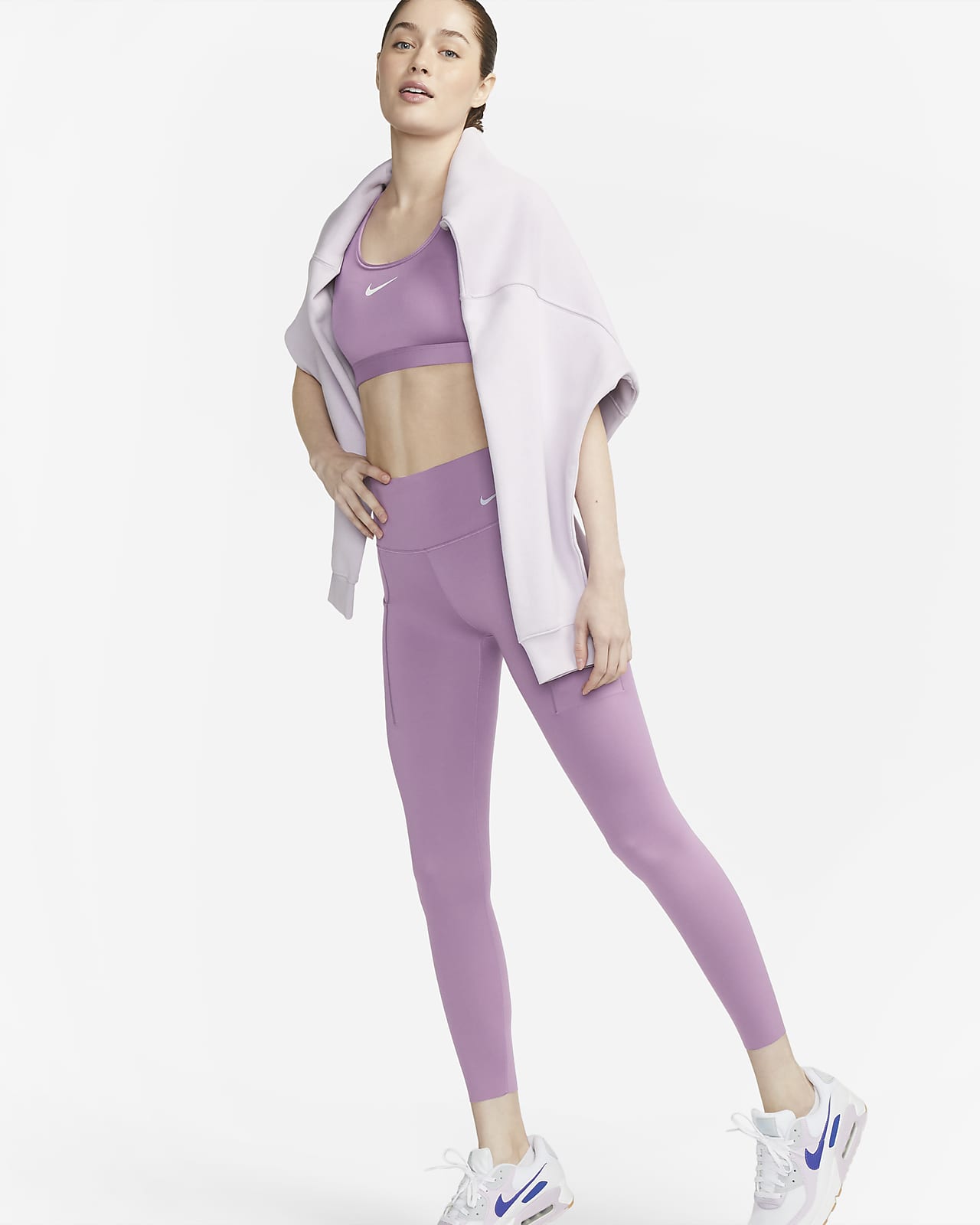 Nike Go 7/8-legging met halfhoge taille, complete ondersteuning en zakken voor dames