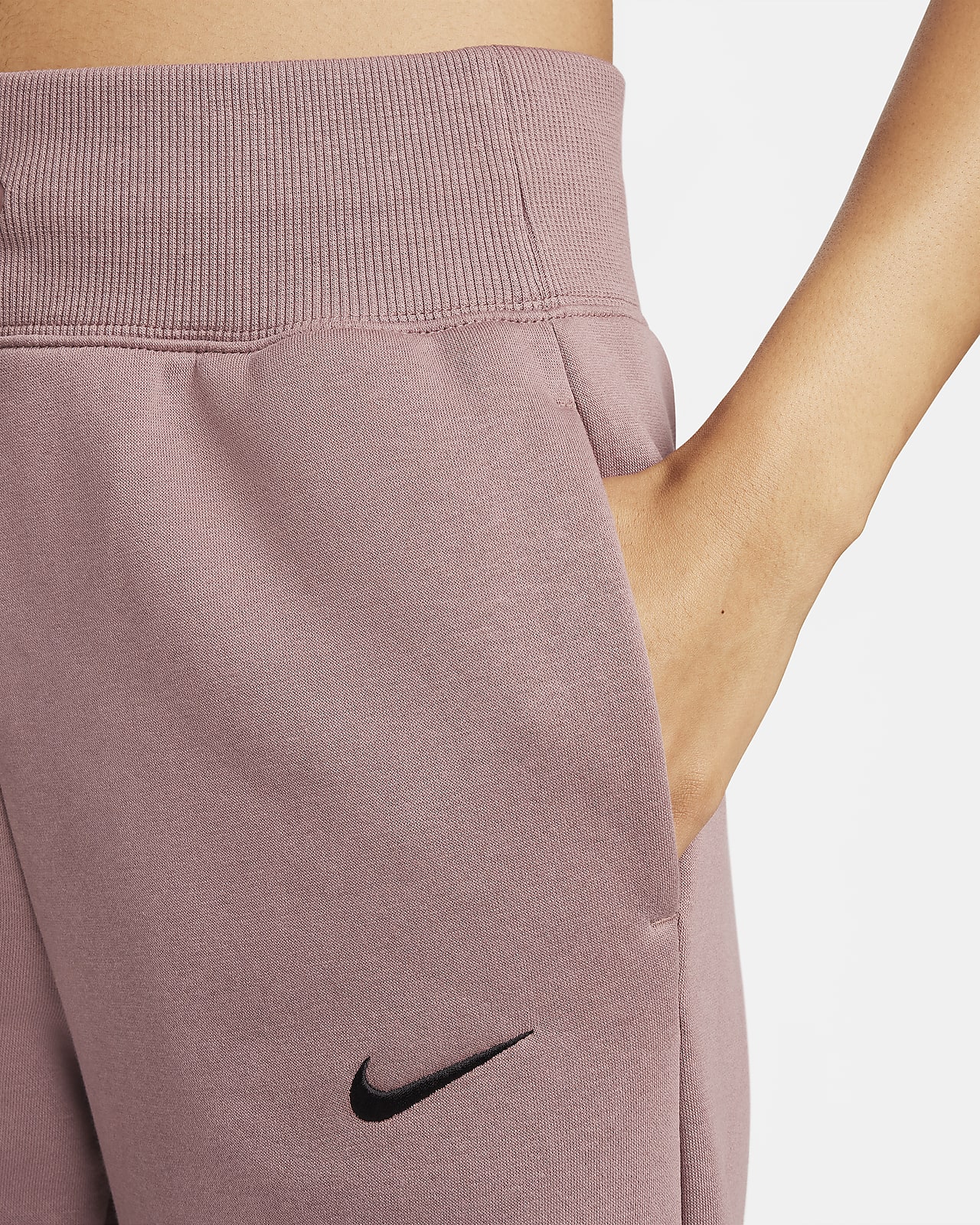 Buy Nike Women's Sportswear Essential Fleece Sweatpants Pink in KSA -SSS
