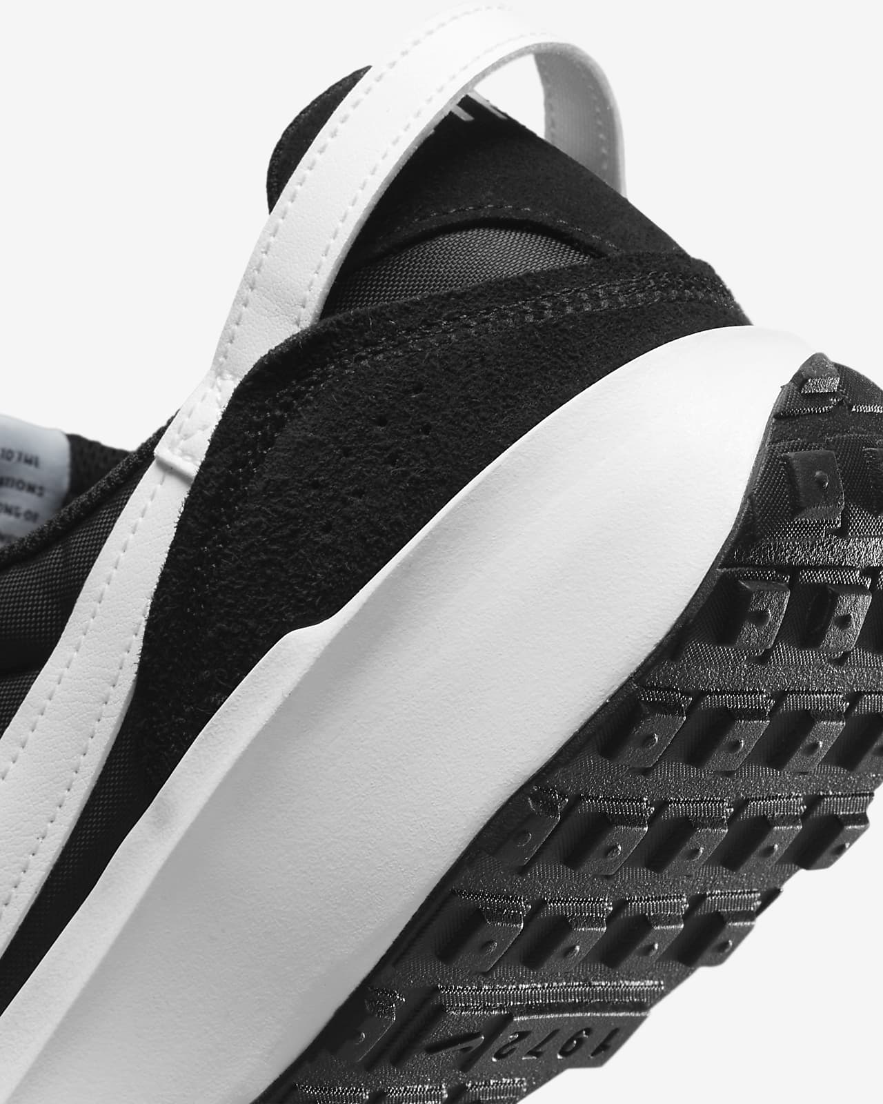 nike waffle debut black white