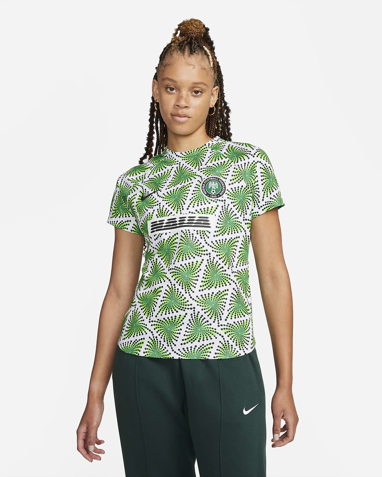 móvil Dedicar Flotar Playera de fútbol para antes del partido Nike Dri-FIT para mujer de Nigeria.  Nike.com