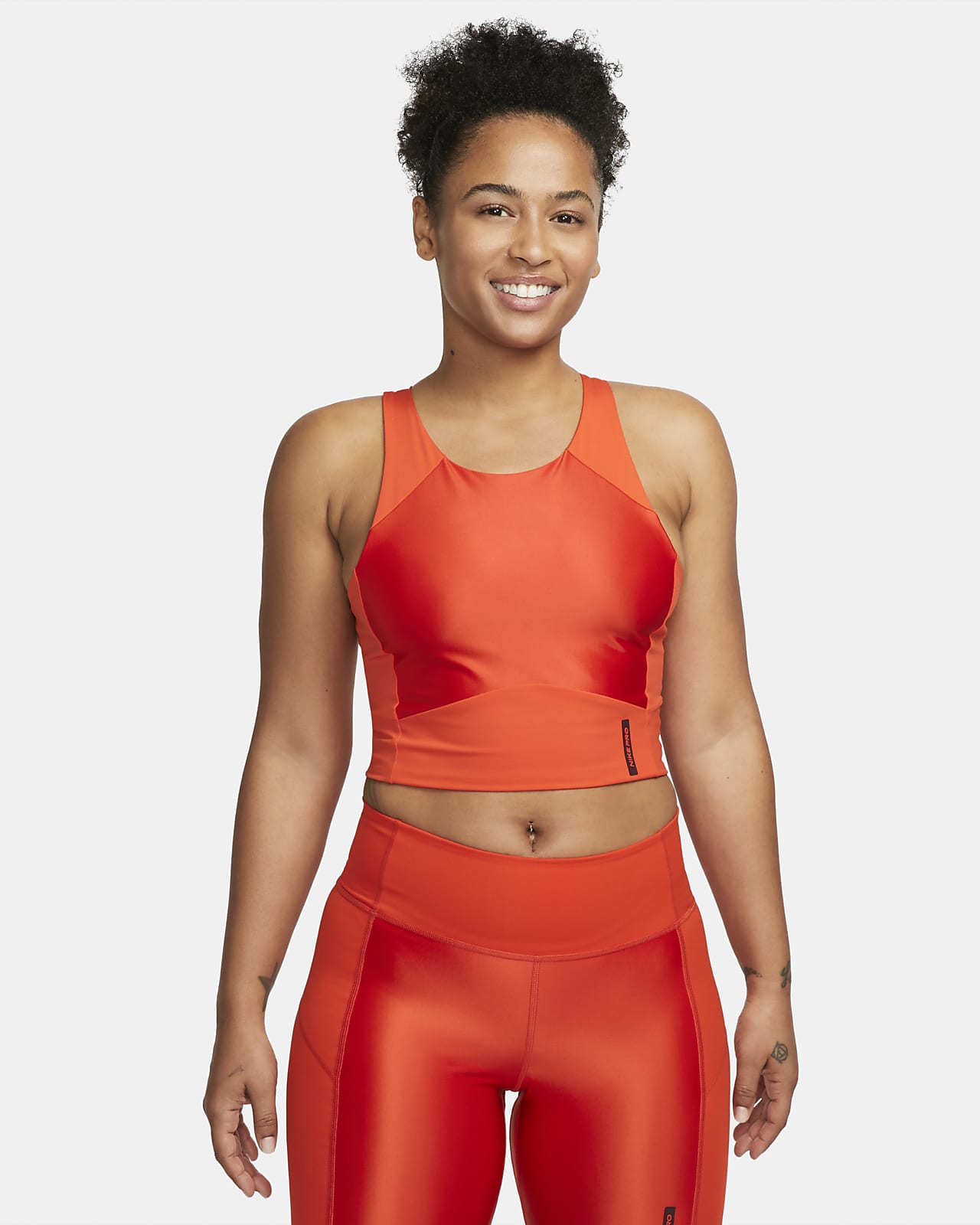Nike Pro Dri-FIT ermeløs magetopp til dame