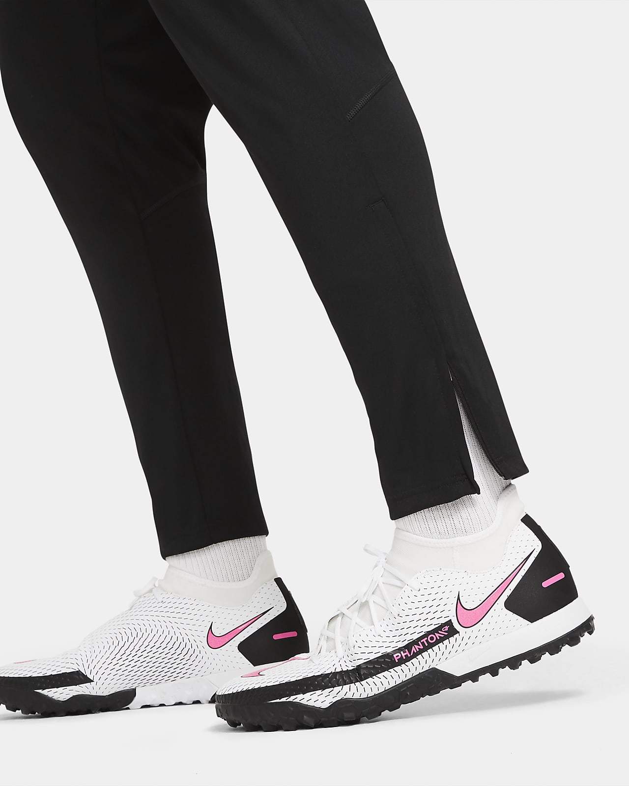 nike track pants with ankle zipper