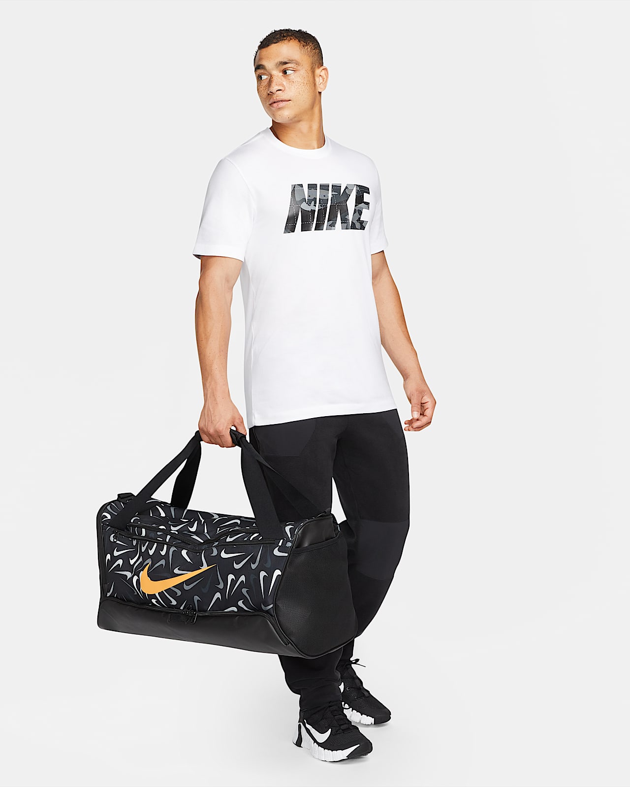 Maleta de entrenamiento estampada Nike Brasilia 9.5 (mediana, 60L). Nike.com