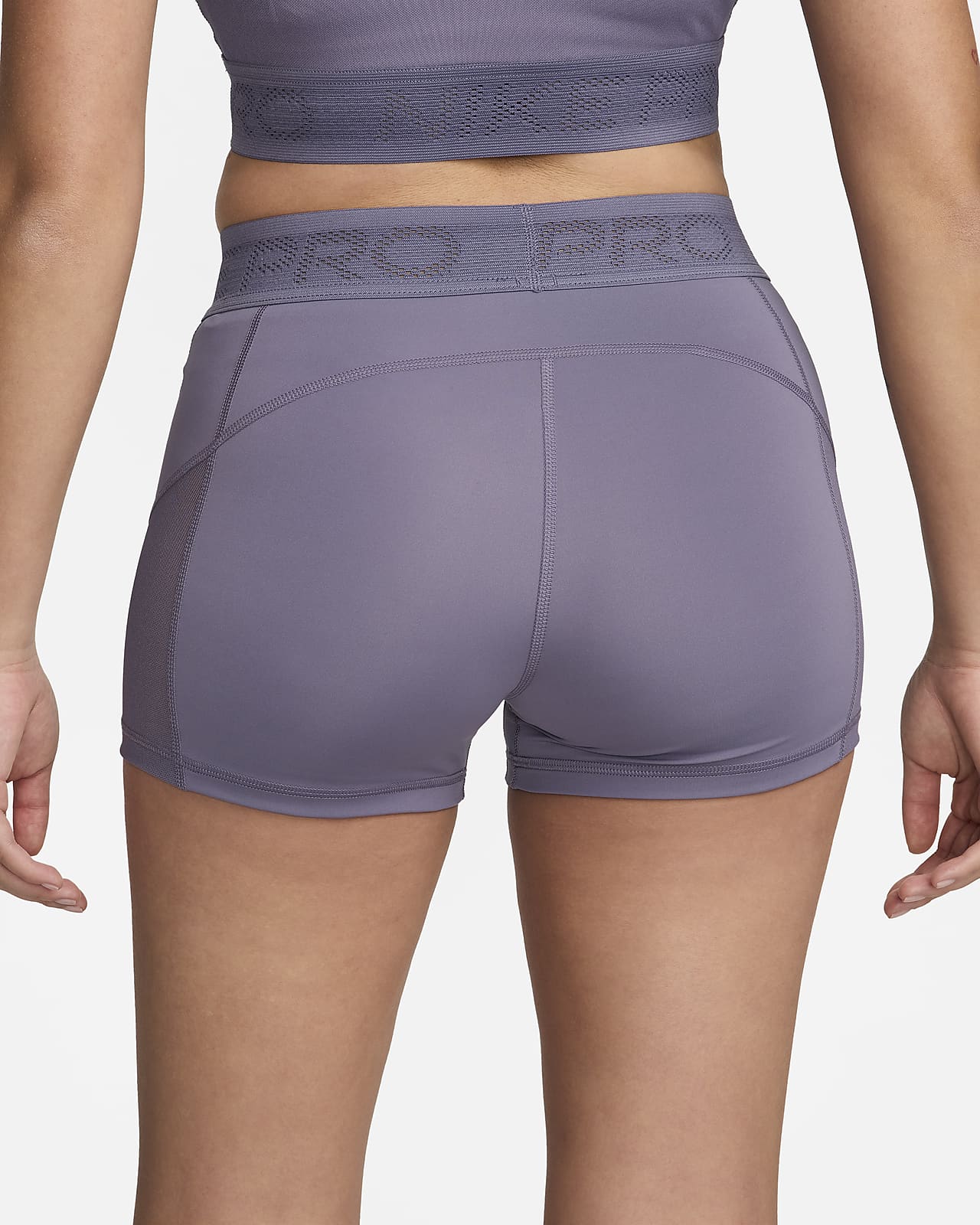 Nike Pro shorts med nettingpaneler og mellomhøyt liv (7,5 cm) til dame