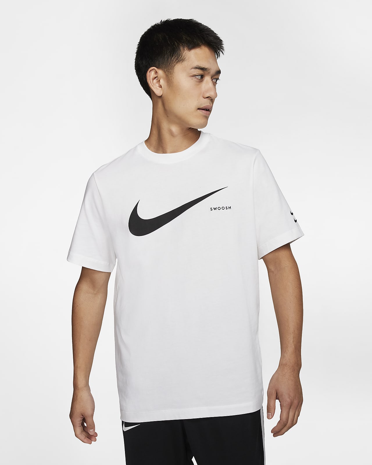 nike shirt with swoosh in middle