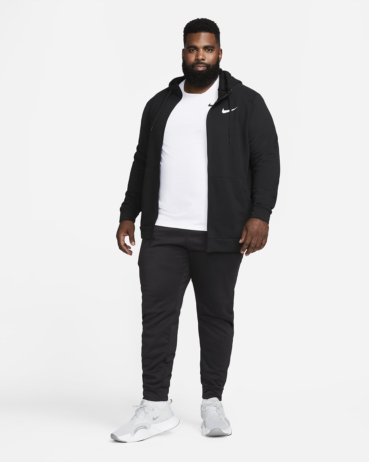 Nike Sportswear Tapered Trousers in Cream
