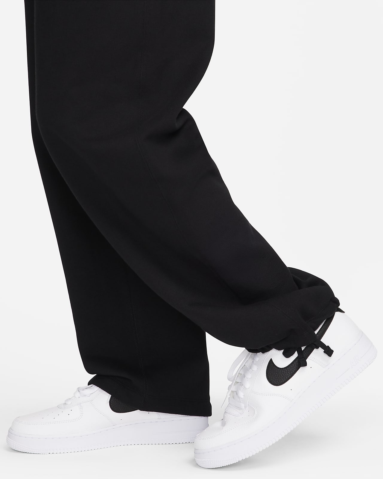 Nike Solo Swoosh Men's Open-Hem Fleece Pants.