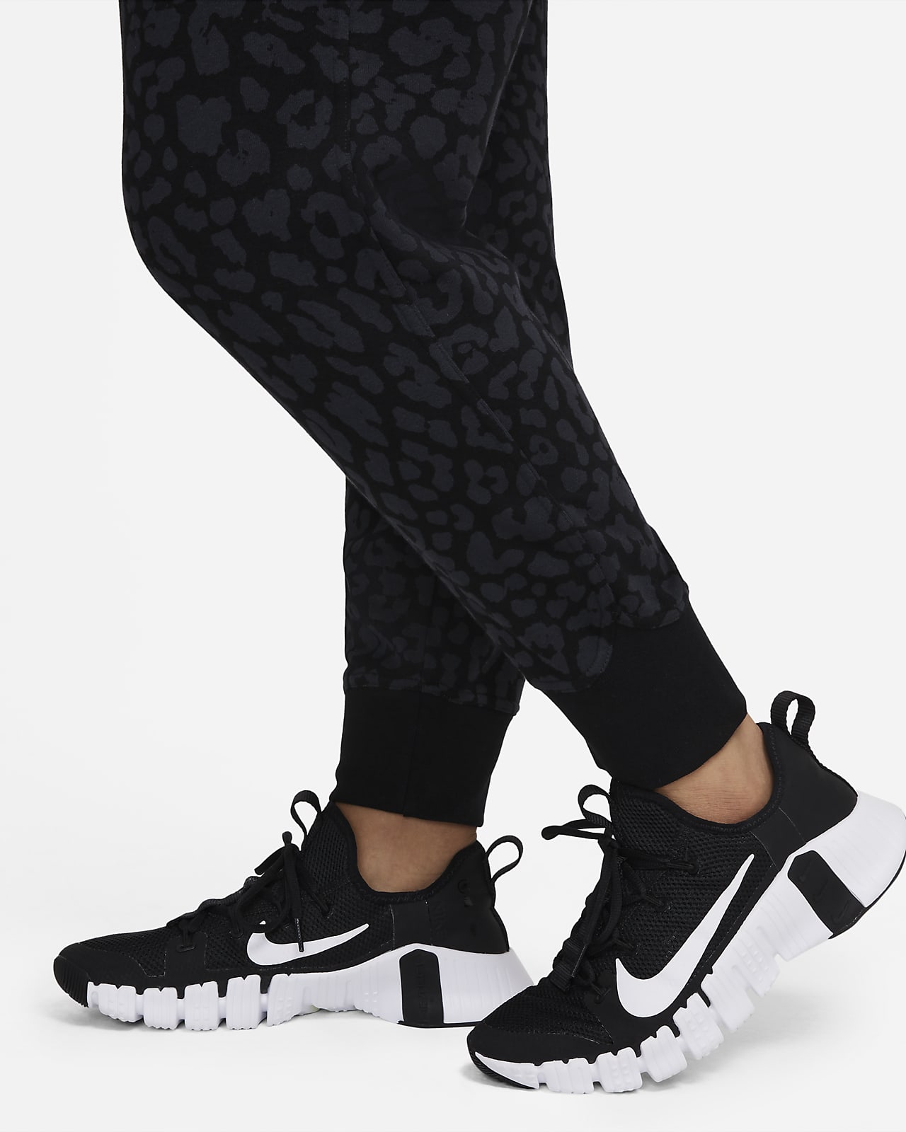 Pantalones de entrenamiento estampados para mujer (talla grande) Nike  Dri-FIT Get Fit. Nike.com
