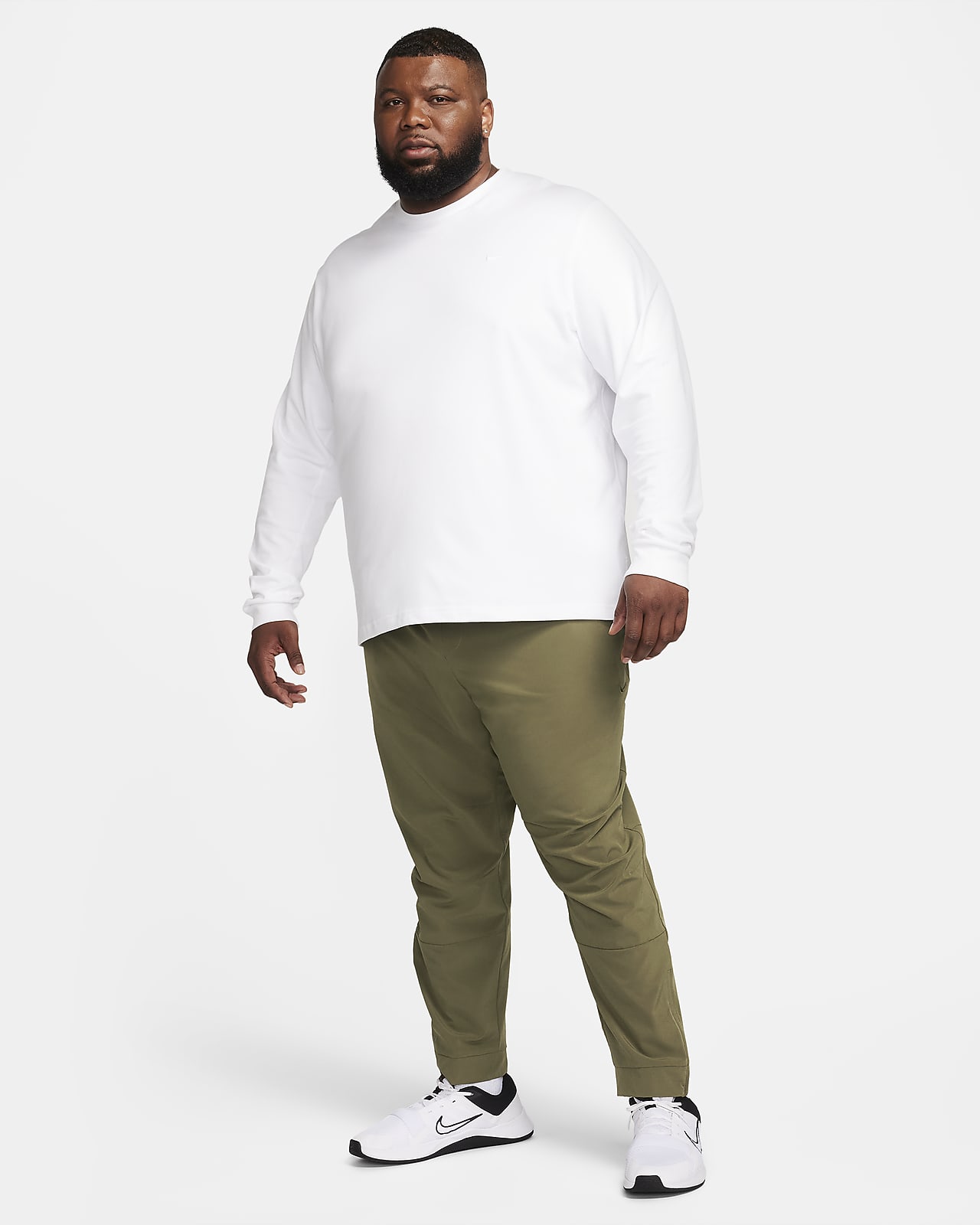 Nike Unlimited Men's Dri-FIT Tapered Leg Versatile Pants.