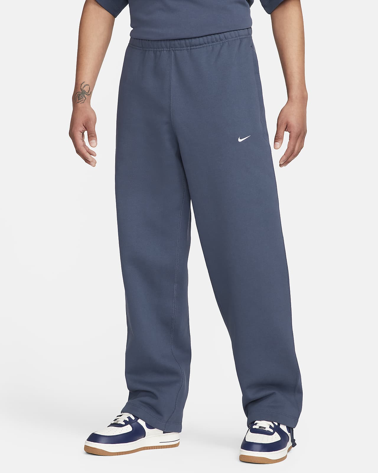 Pants de tejido Fleece con dobladillo abierto para hombre Nike Solo Swoosh