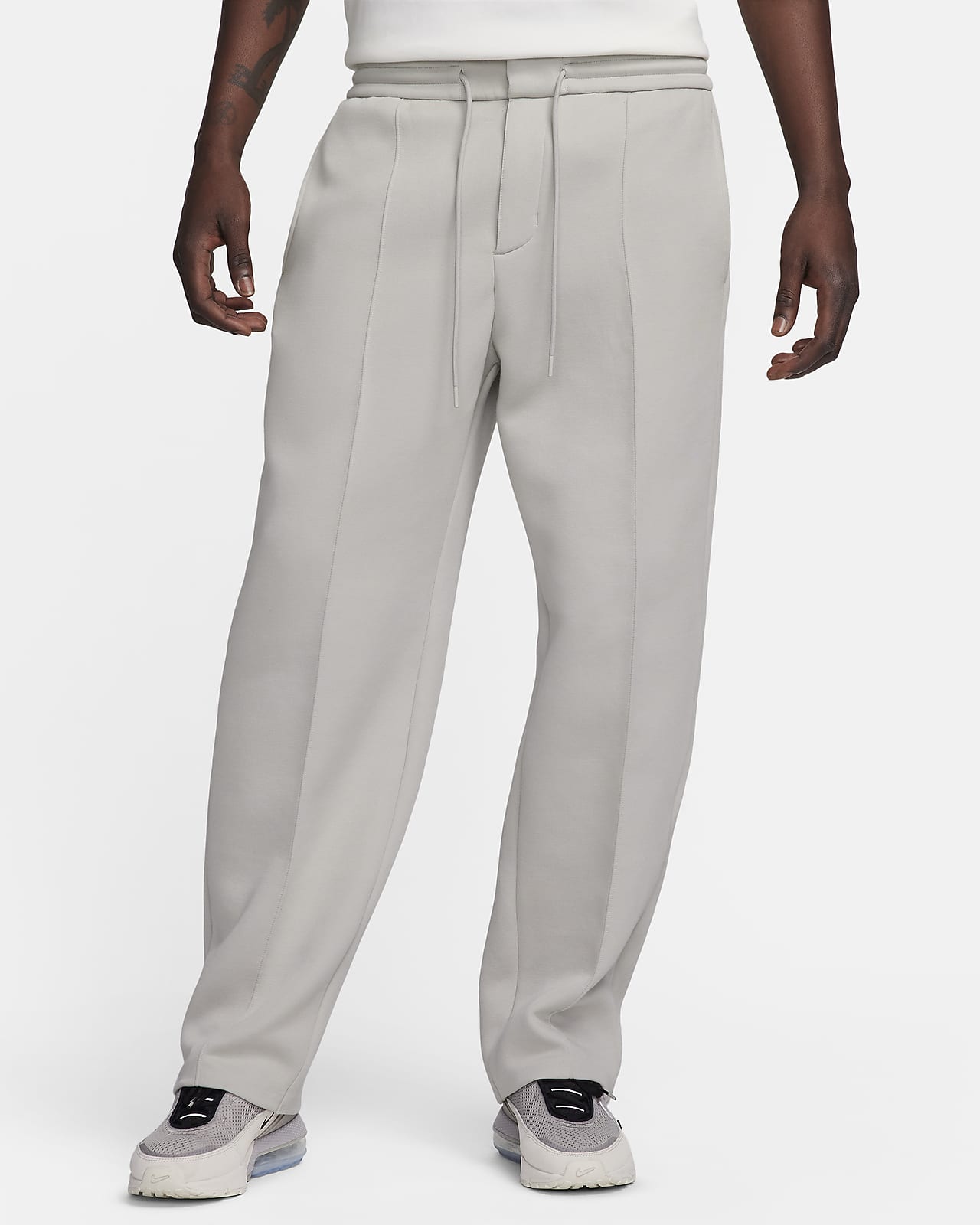 Nike sweatpants best sale loose bottom