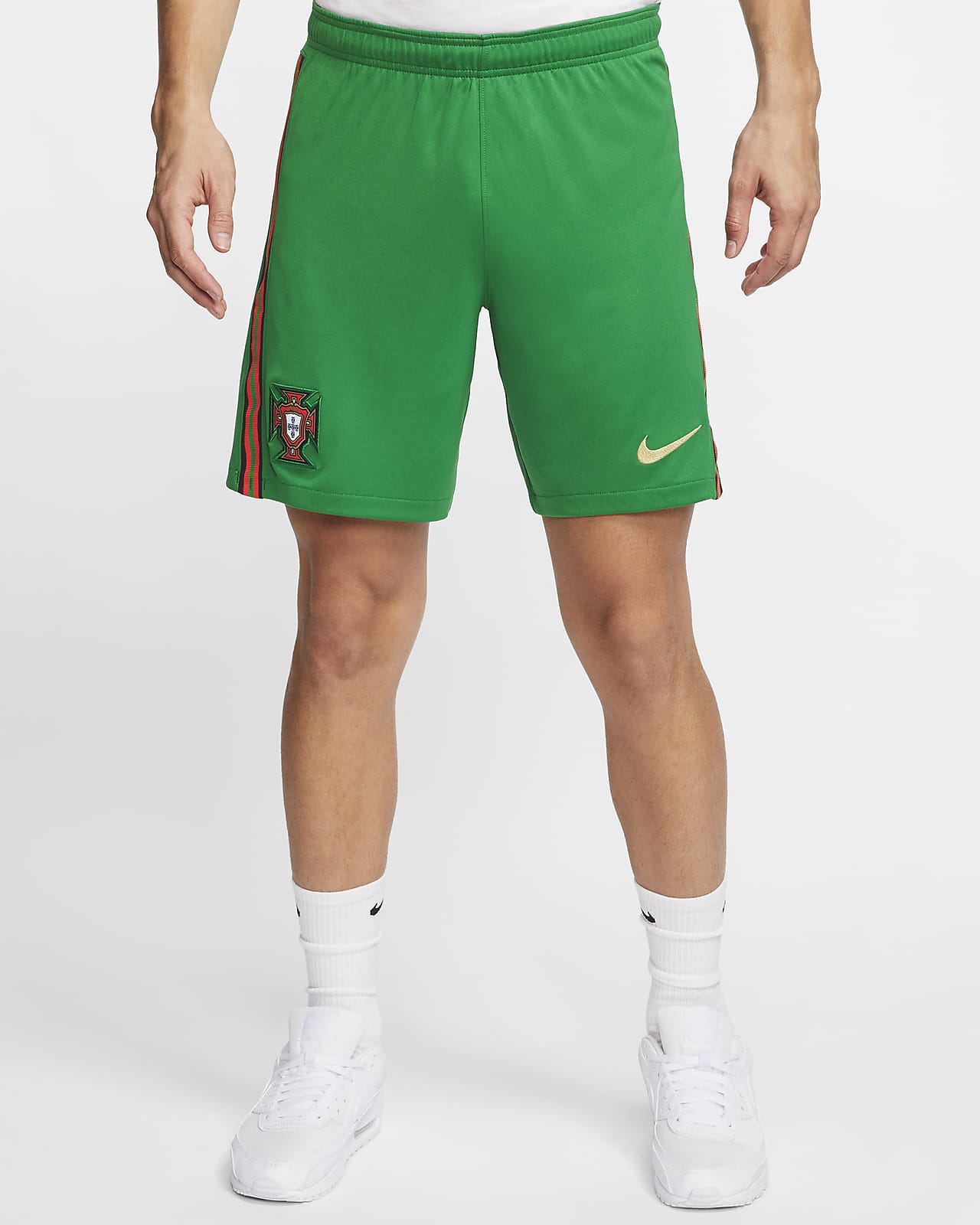 green nike football shorts