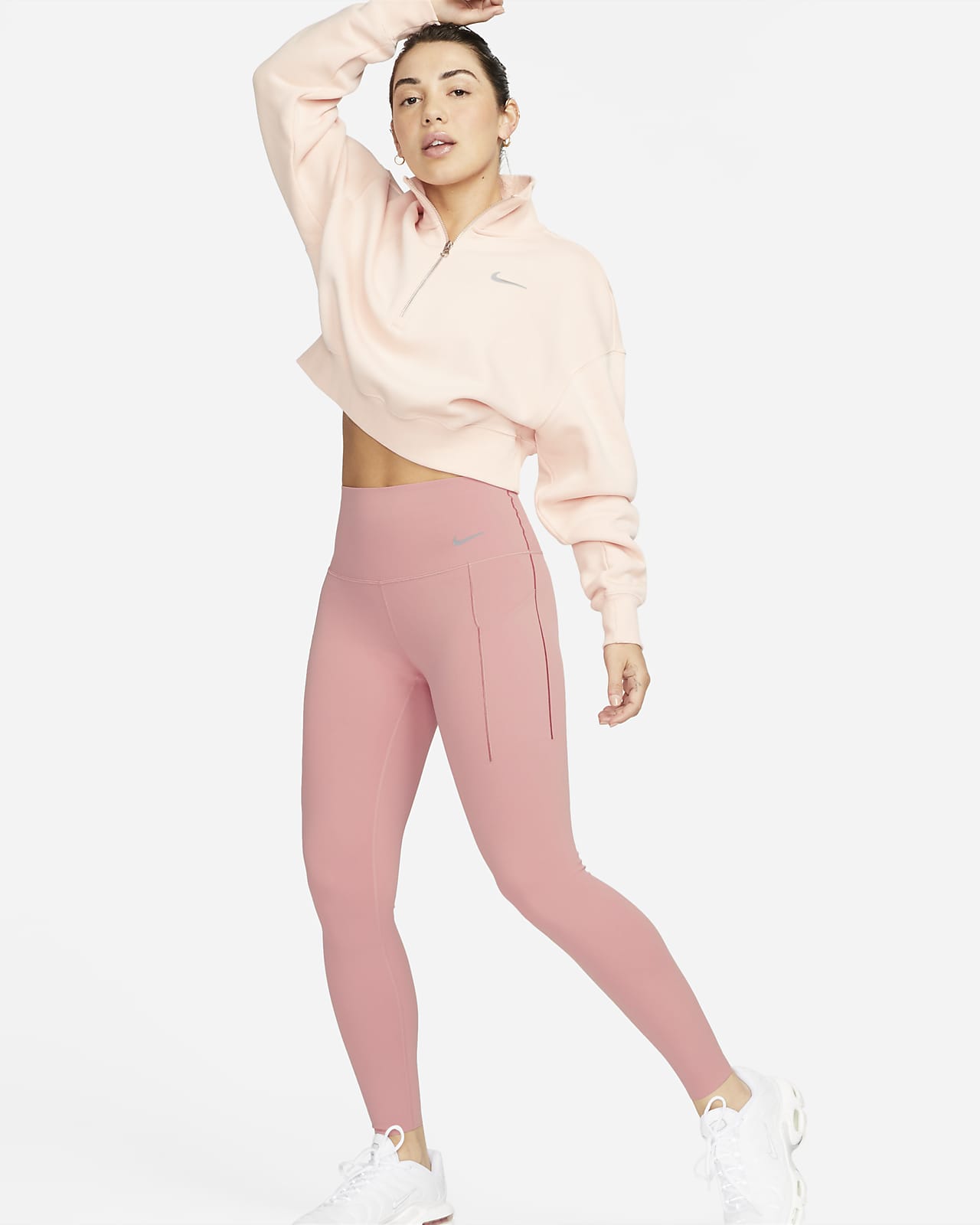Nike Universa-leggings i længde med medium støtte, høj talje og lommer til kvinder. Nike