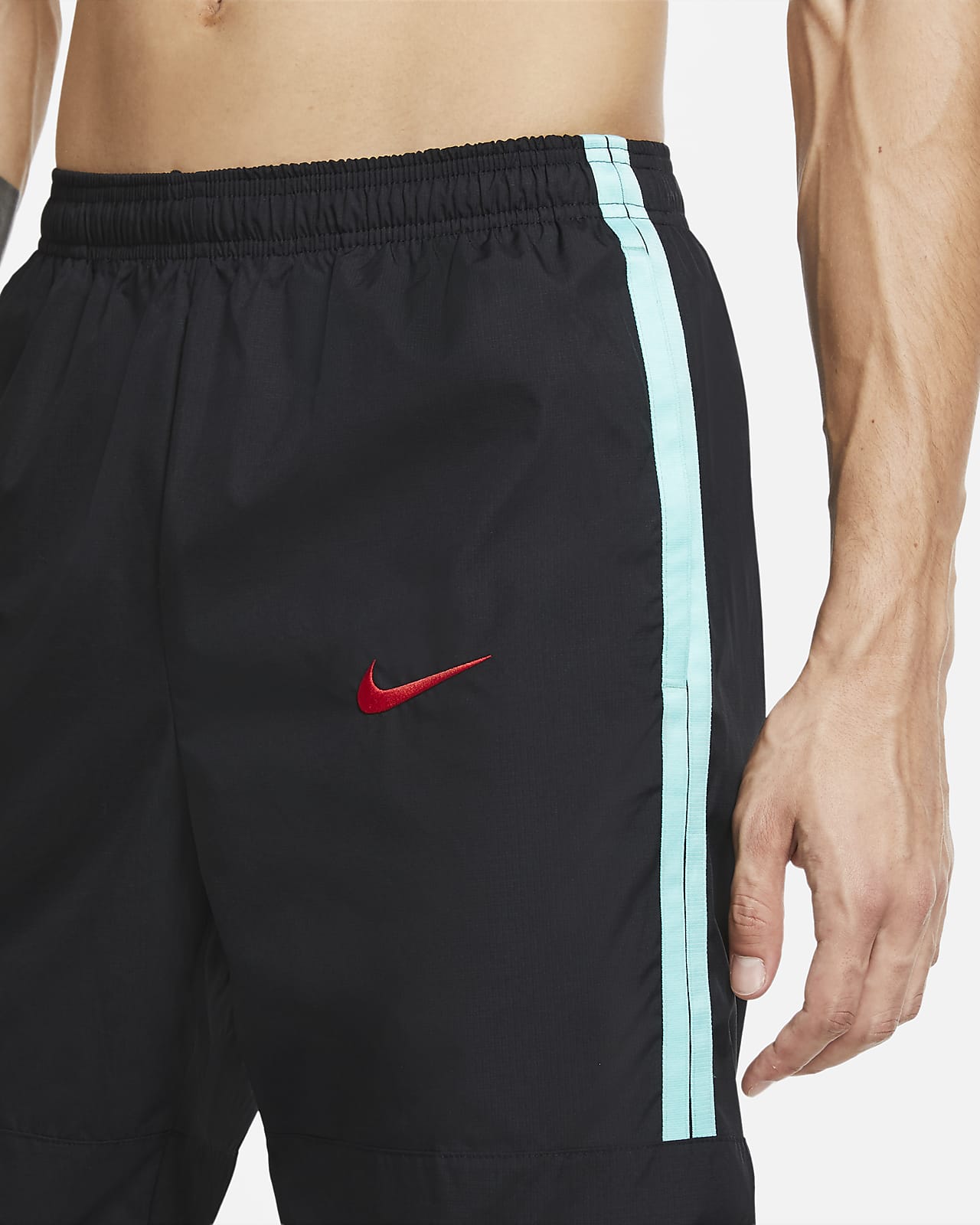 nike woven tracksuit bottoms mens
