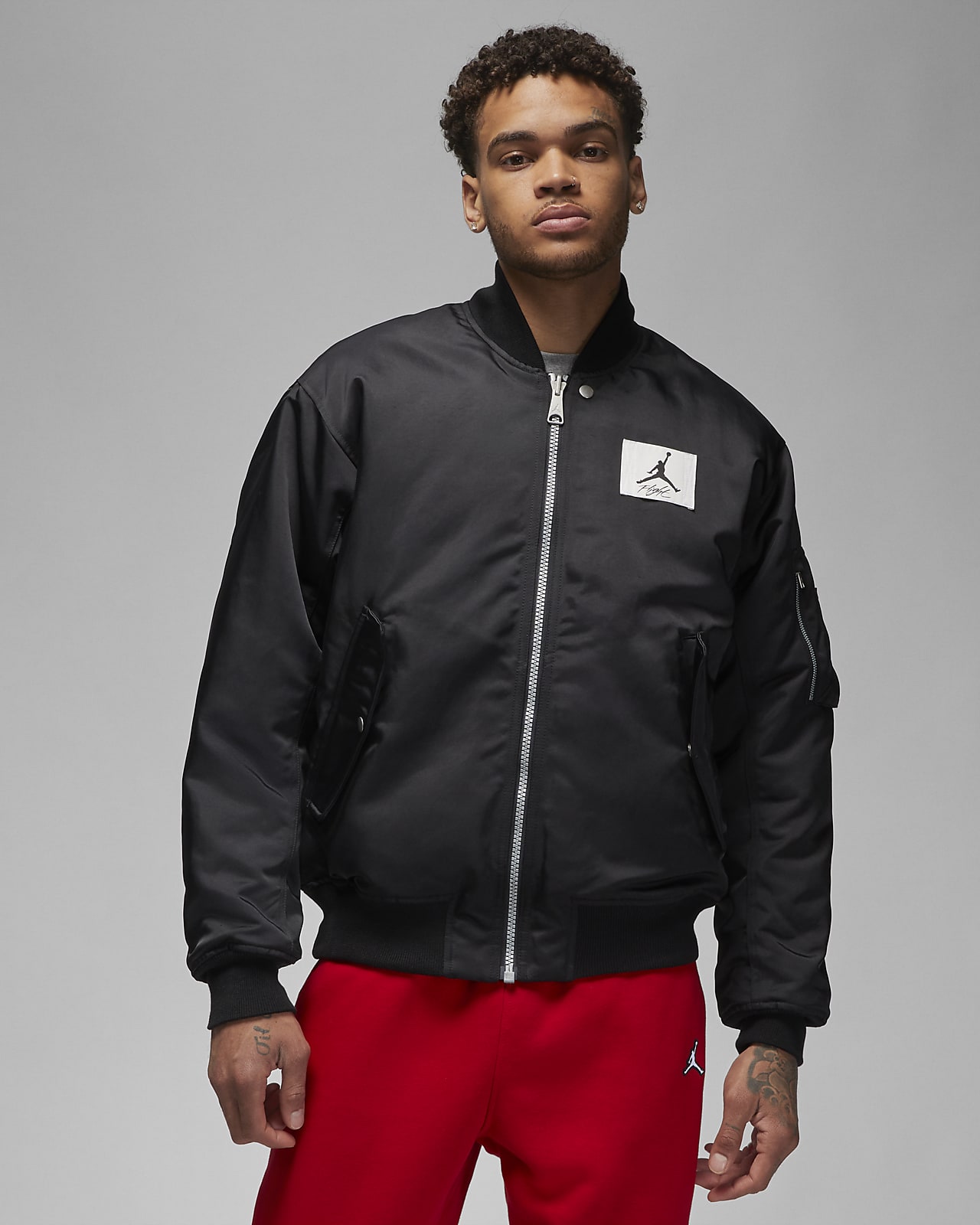 Jordan Essentials Men's Statement Varsity Jacket. Nike AT