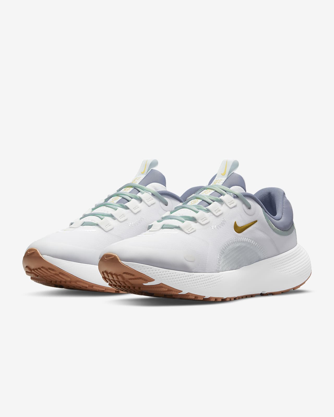 nike running escape run sneakers in white and gold