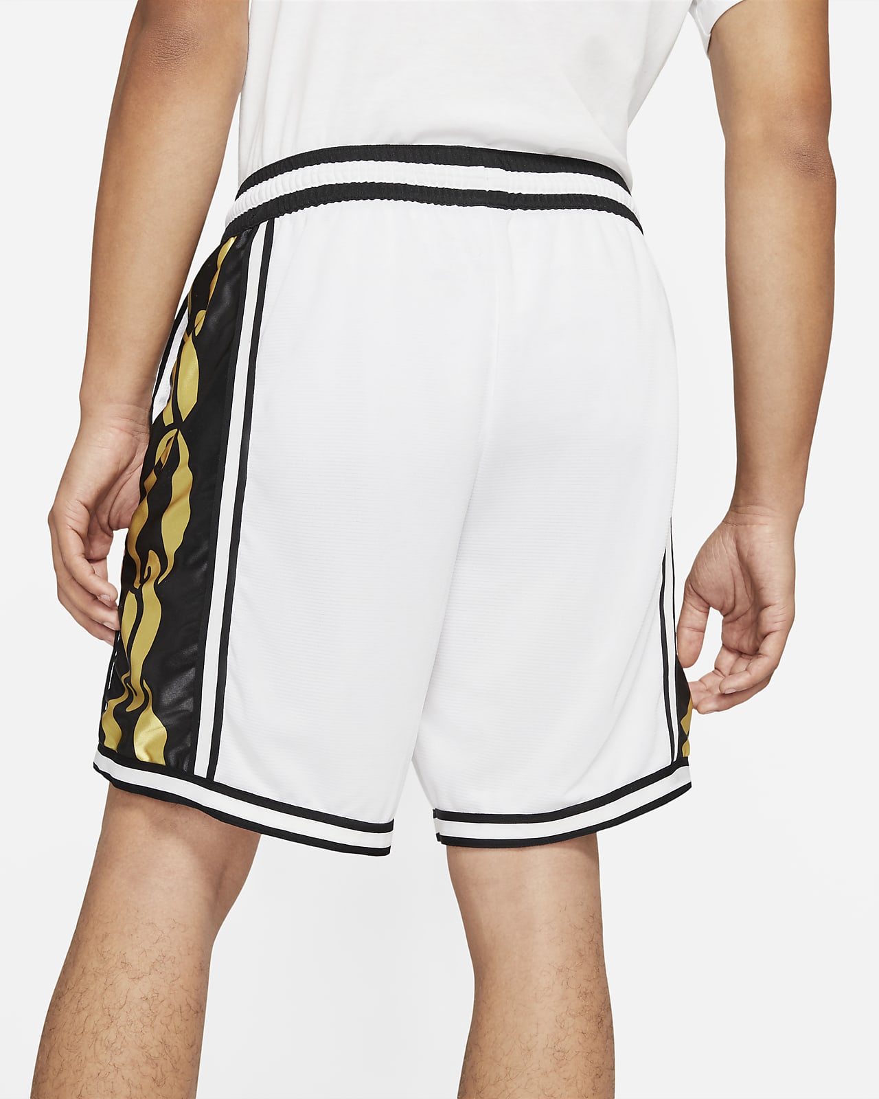 white and gold nike shorts