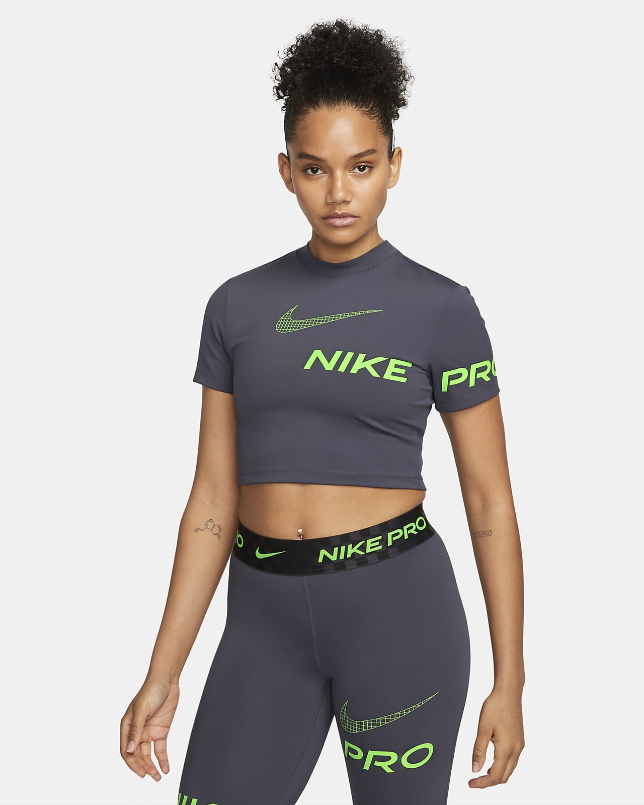 Nike Pro Dri-FIT Women's Short-Sleeve Cropped Graphic Top. Nike LU