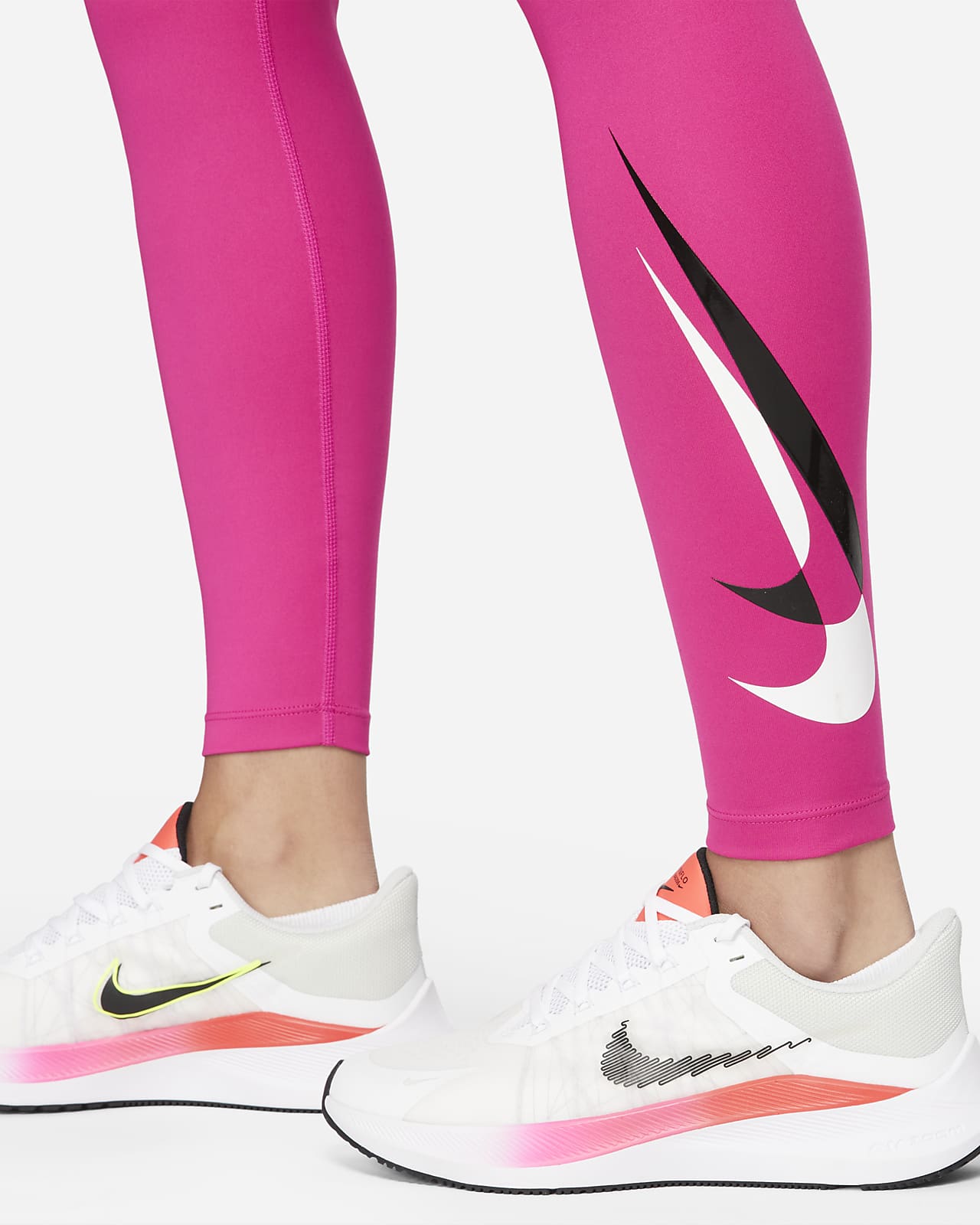 Nike Swoosh Women's 7/8 Mid-Rise Graphic Running Leggings. UK